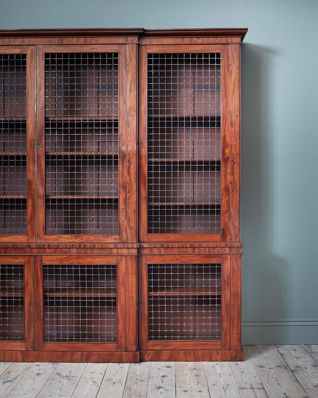 Carved A Large Early Nineteenth Century Mahogany Architectural Bookcase