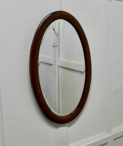 Large Edwardian Oak Oval Mirror