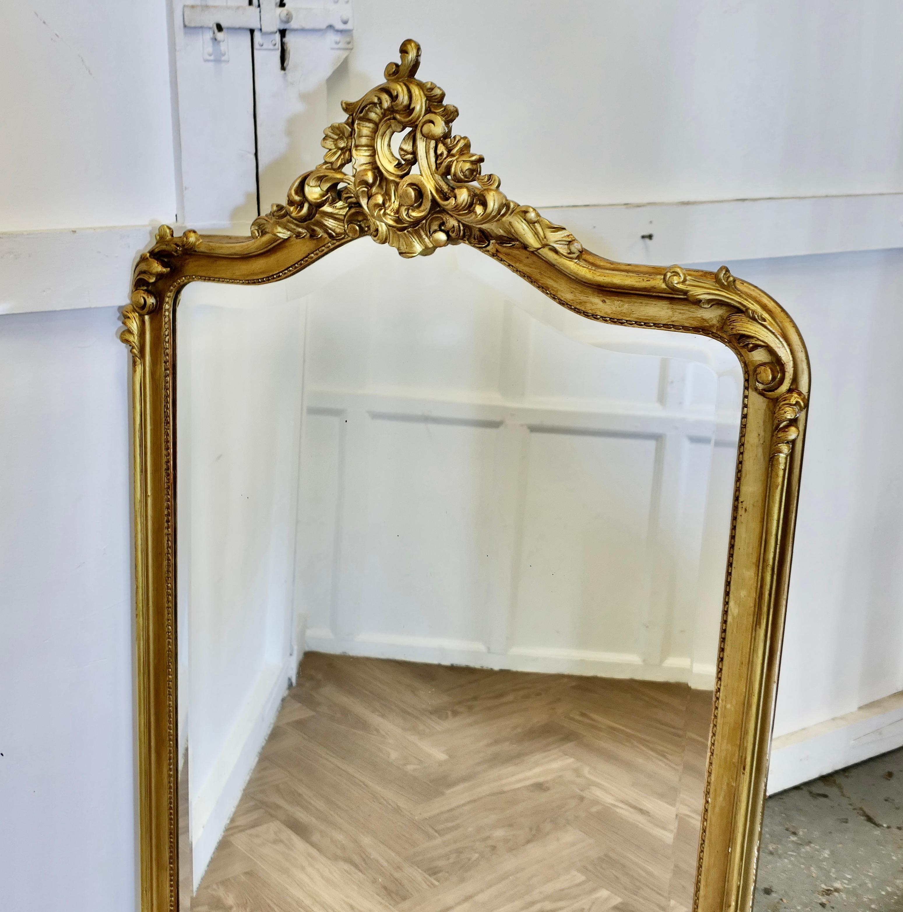 A Large Elaborate French Rococo Gilt Console Mirror Decorated with Scrolls In Good Condition For Sale In Godshill, Isle of Wight