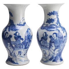 A large, elegant pair of Chinese Blue and White vases