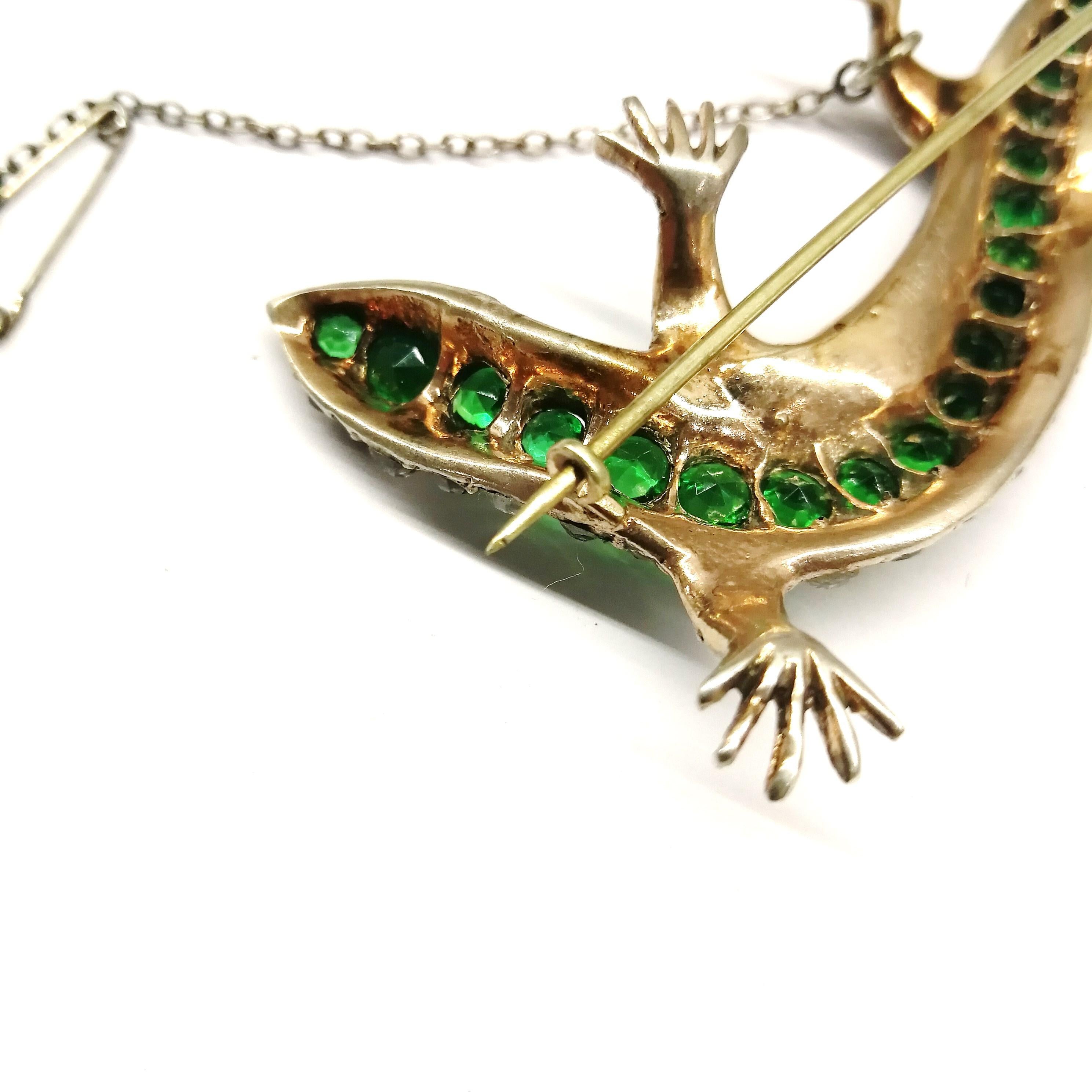 Edwardian A large emerald and clear paste 'lizard' brooch, c 1900. For Sale