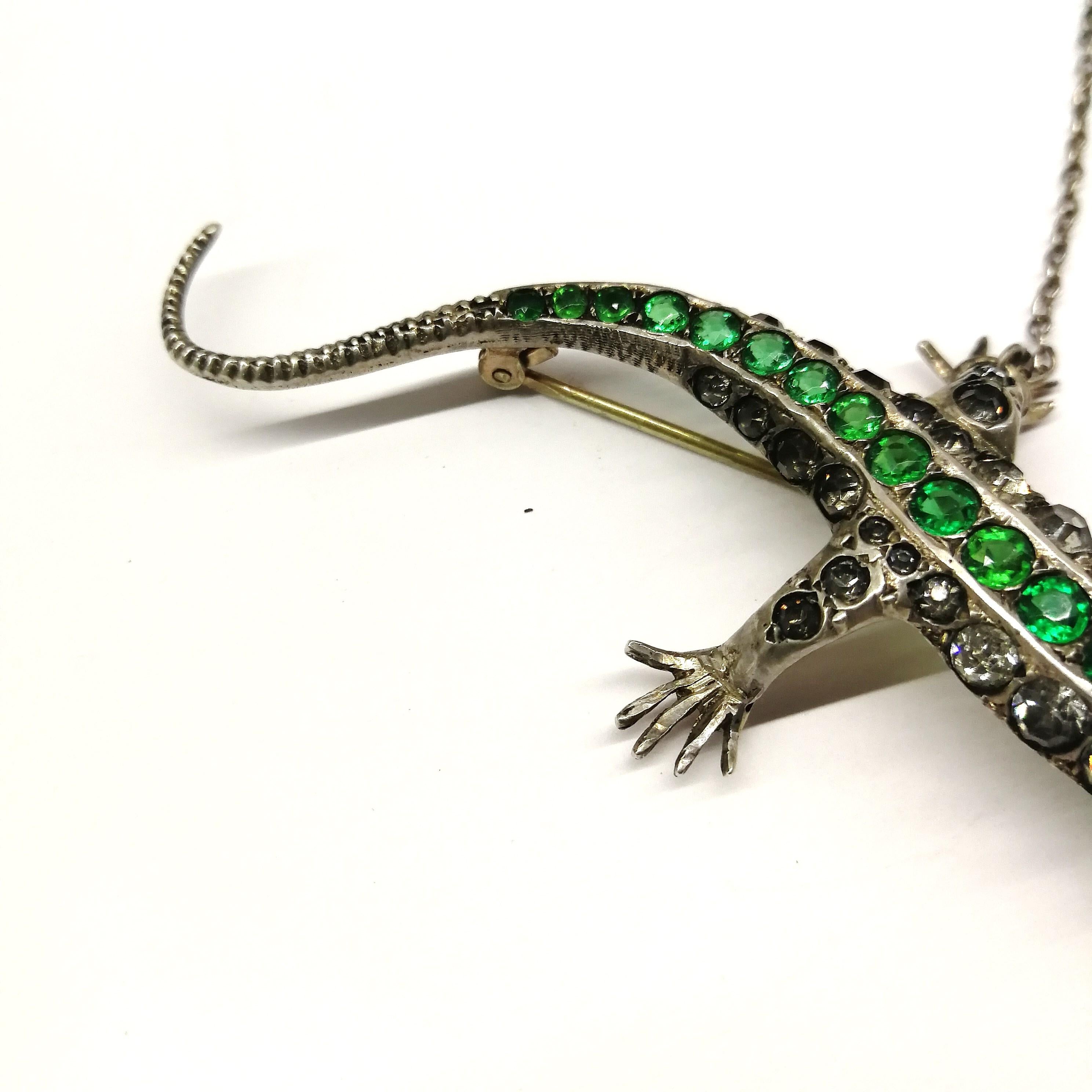 A large emerald and clear paste 'lizard' brooch, c 1900. For Sale 1