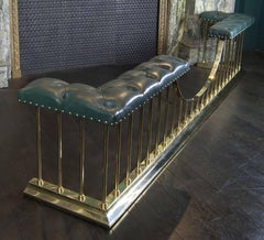 A Large English Brass Fireplace Club Fender