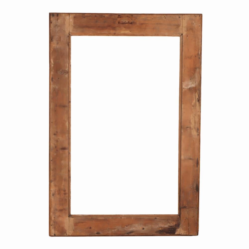 A great size! Understated and timeless, this antique English pine frame brings the quiet beauty of countryside craftsmanship into your home. Pine with a warm, honeyed patina, this piece reflects the humble elegance of 19th-century rural