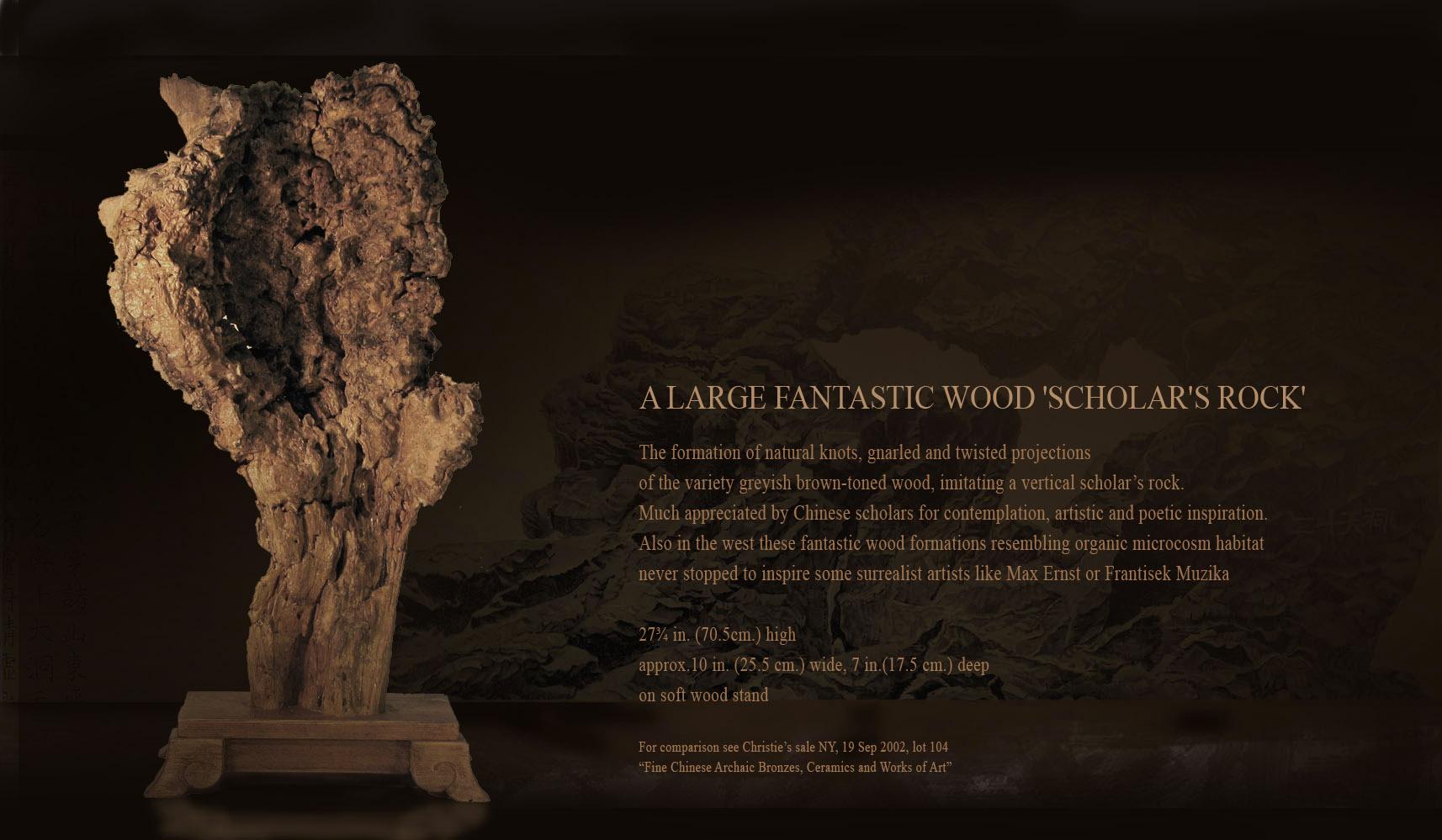 A large fantastic wood 'scholar's rock'

The formation of natural knots, gnarled and twisted projections 
Of the variety greyish brown-toned wood, imitating a vertical scholar’s rock. 
Much appreciated by Chinese scholars for contemplation,