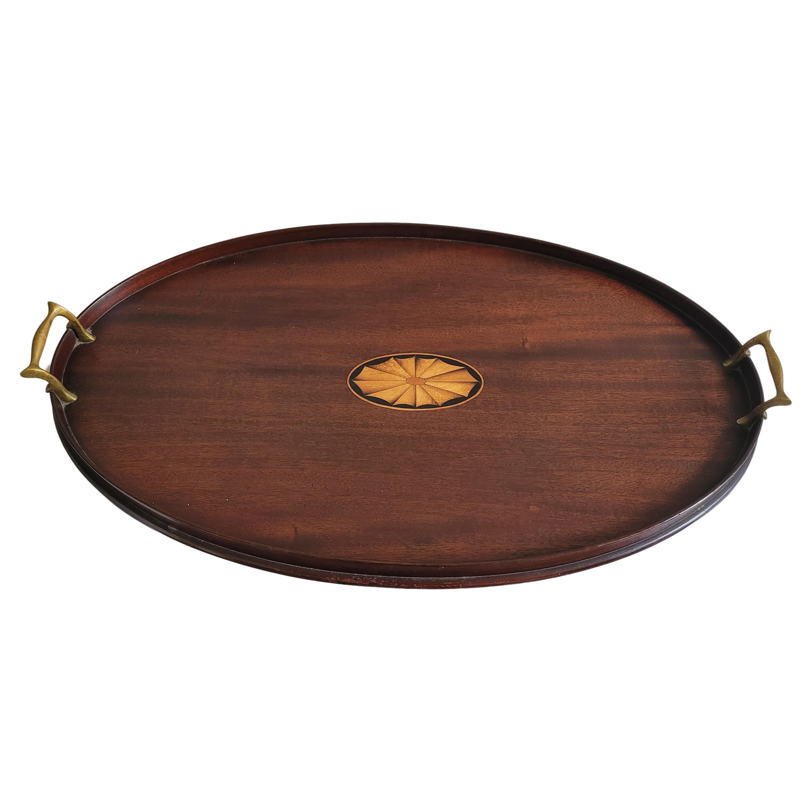 A Large Victorian period George III Style Inlaid Mahogany Two Handle Galleried Oval Tray. Solid brass handles.
Good antique condition with patina. Measures 24.5