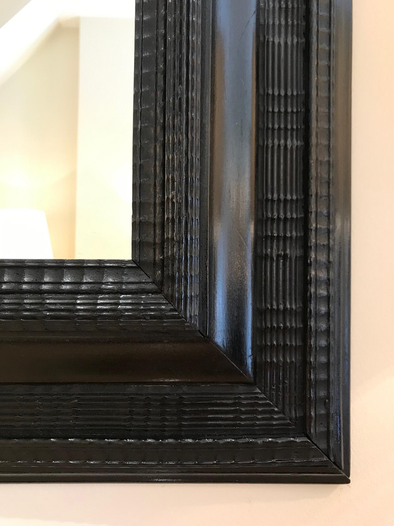Dutch Large Flemish Ebonised Carved Wood Ripple Frame Mirror
