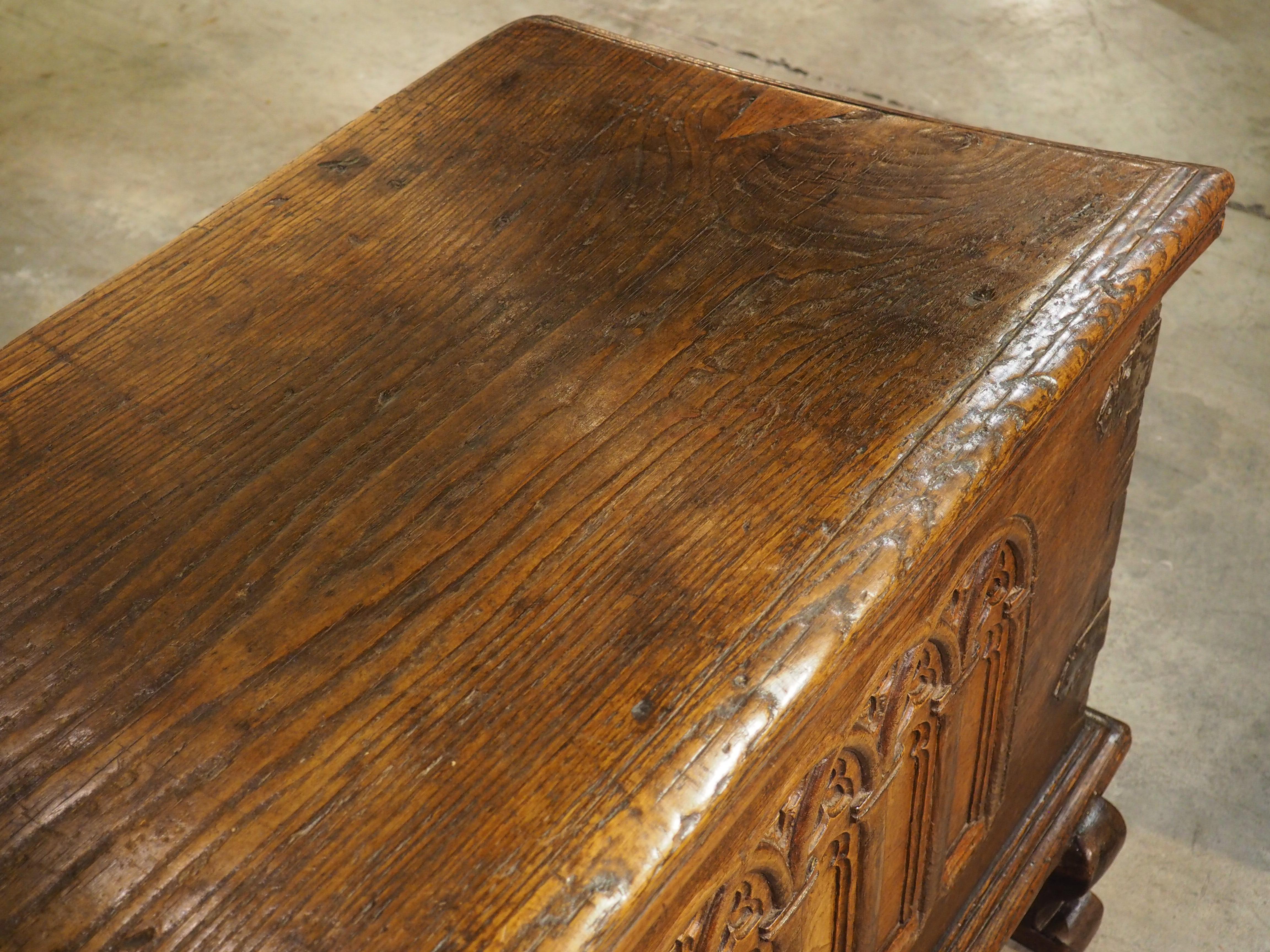 A Large French 17th Century Gothic Style Trunk in Carved Chestnut 5