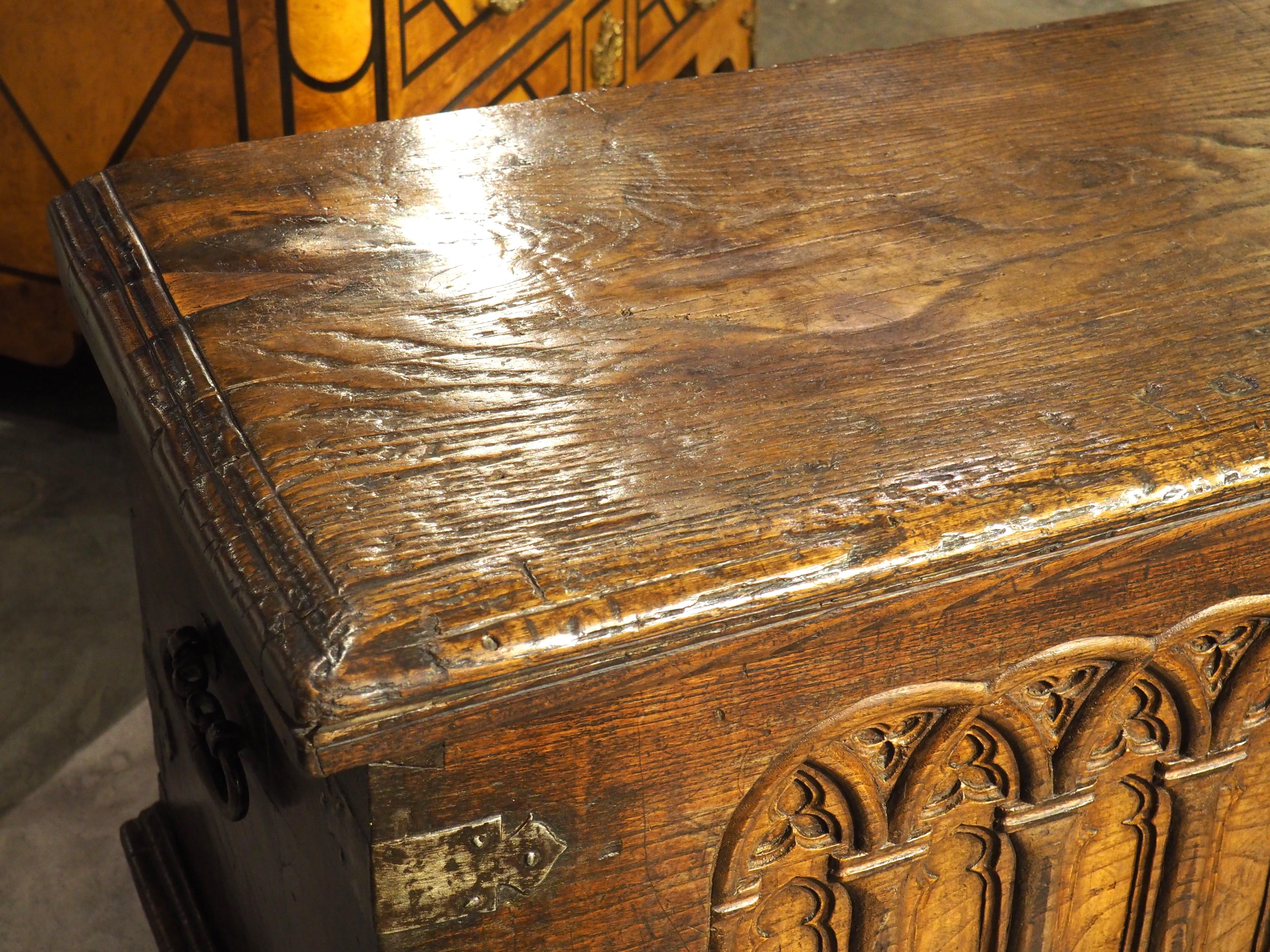 A Large French 17th Century Gothic Style Trunk in Carved Chestnut 7