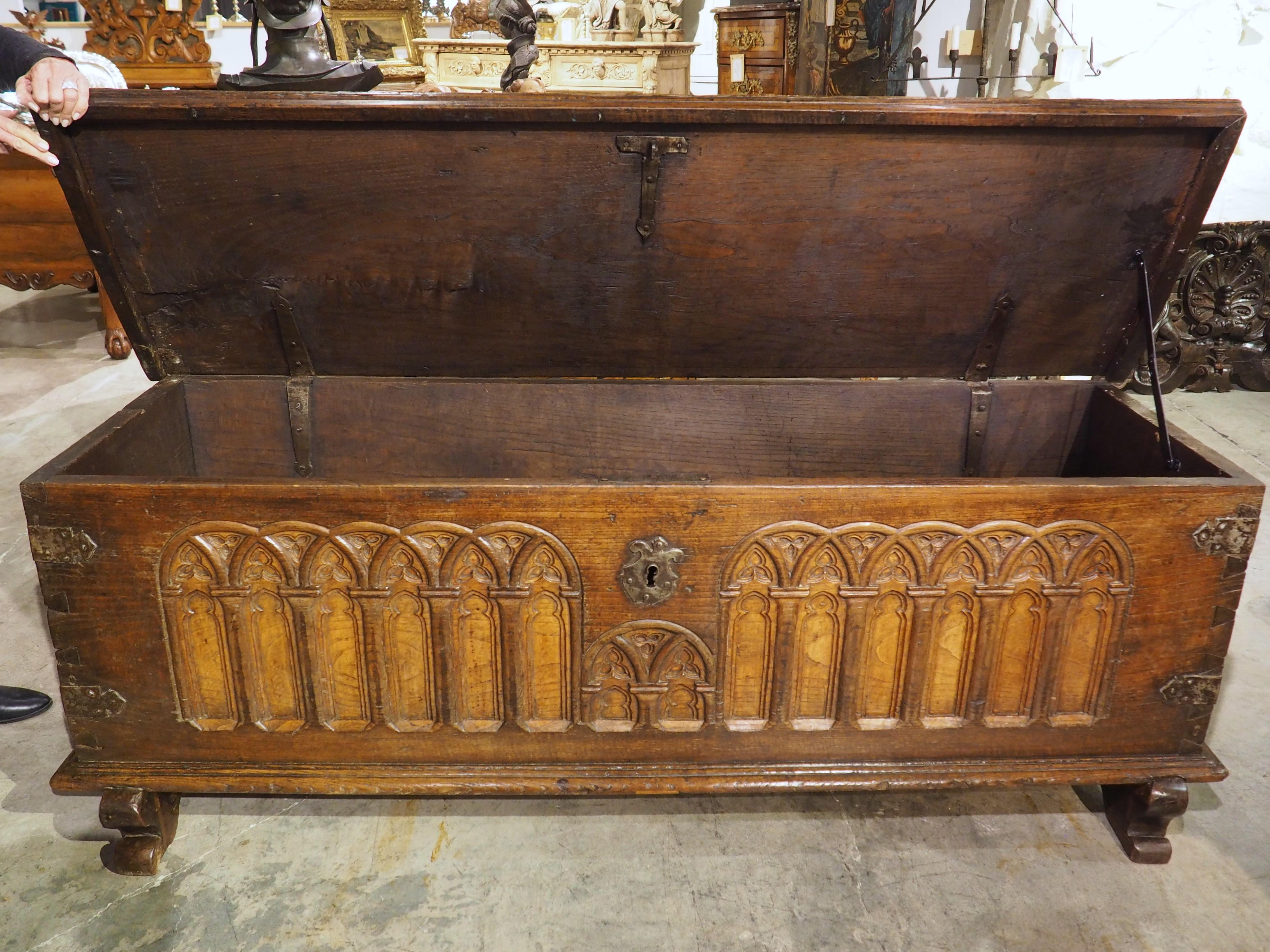 A Large French 17th Century Gothic Style Trunk in Carved Chestnut 9
