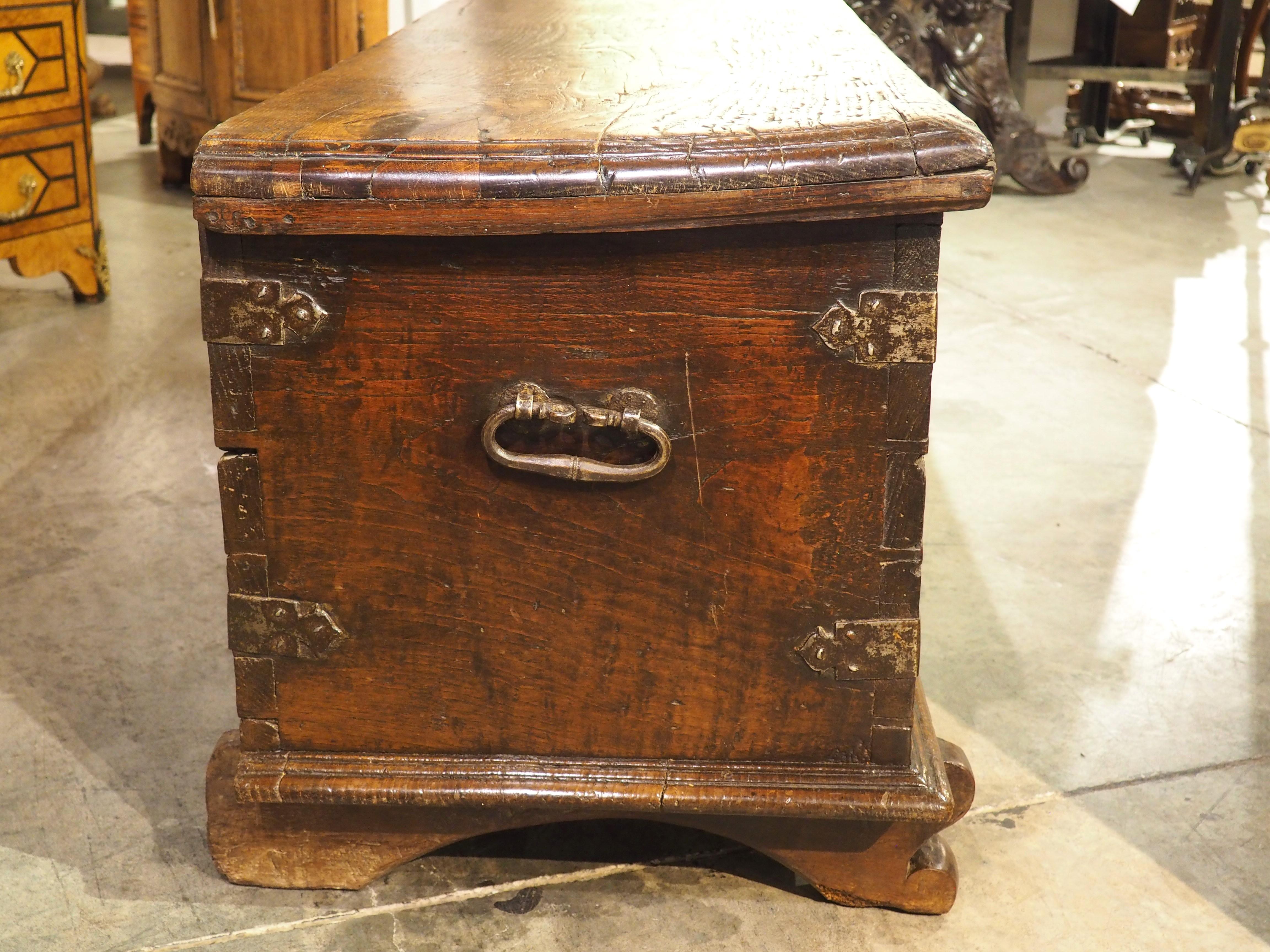 A Large French 17th Century Gothic Style Trunk in Carved Chestnut 12