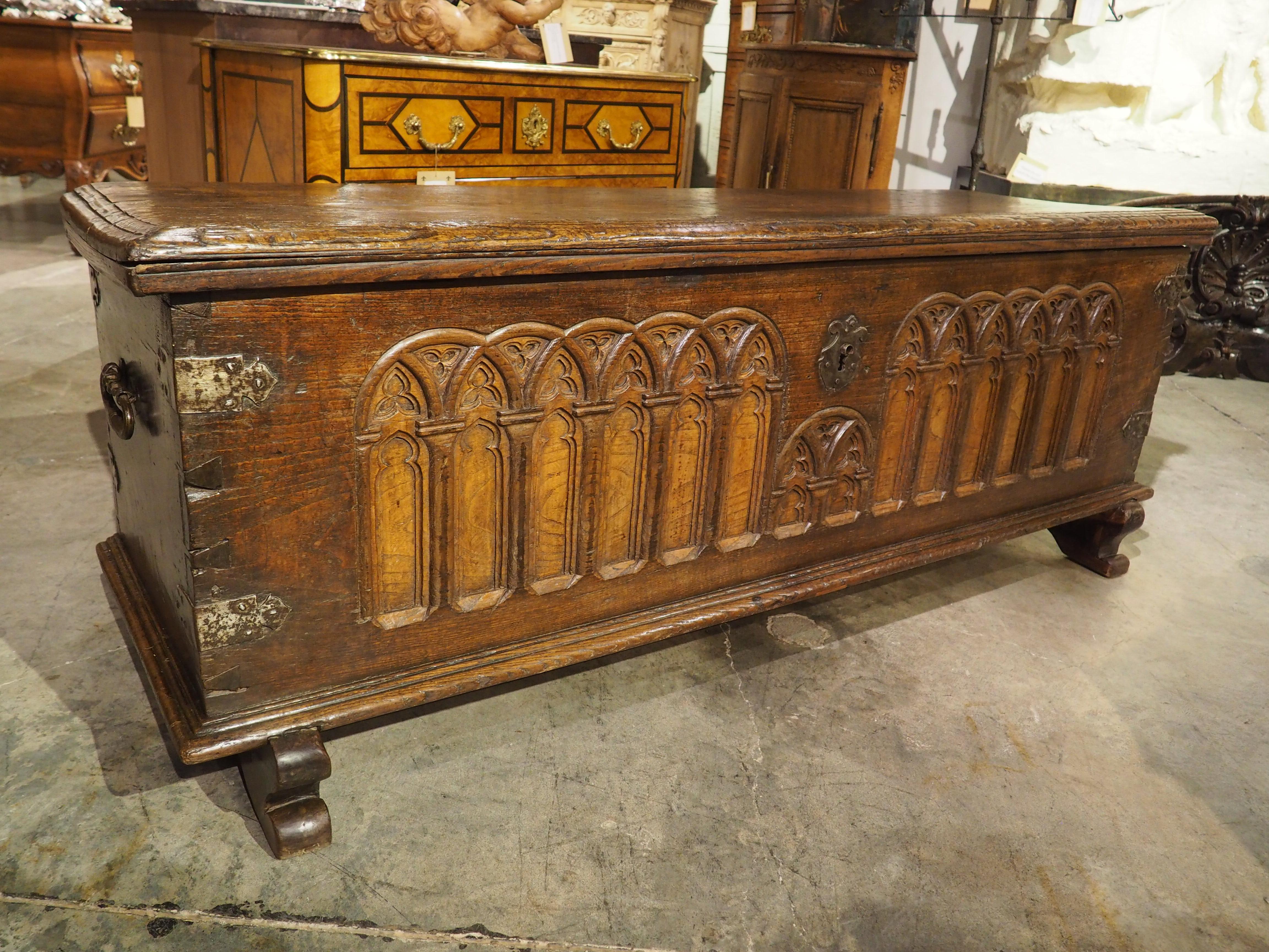 Hand-Carved A Large French 17th Century Gothic Style Trunk in Carved Chestnut