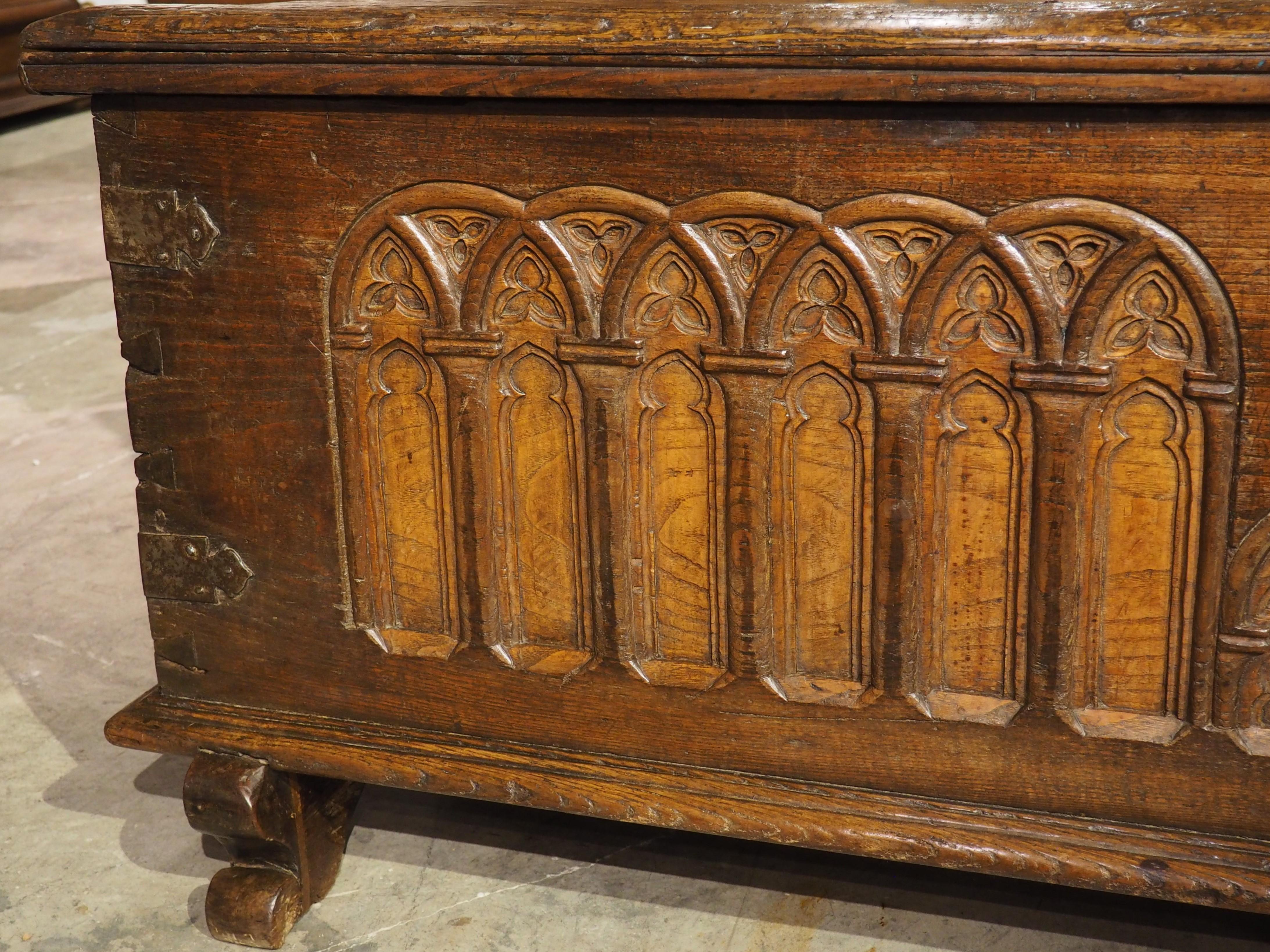 Metal A Large French 17th Century Gothic Style Trunk in Carved Chestnut