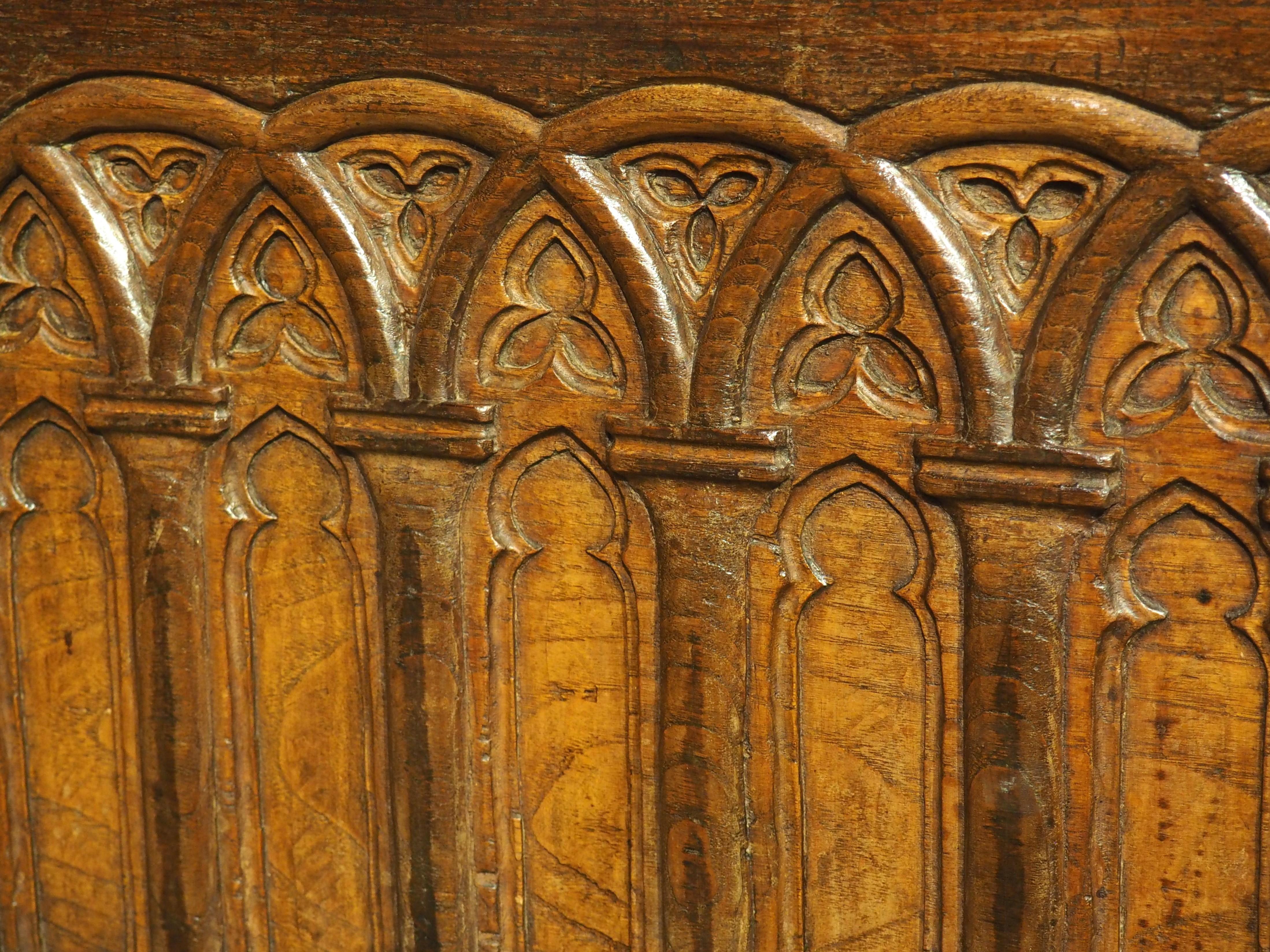 A Large French 17th Century Gothic Style Trunk in Carved Chestnut 1