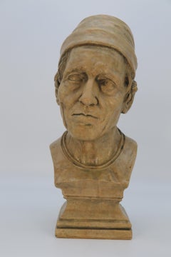 A large French 19th century simulated stone plaster bust of a medieval man C1860