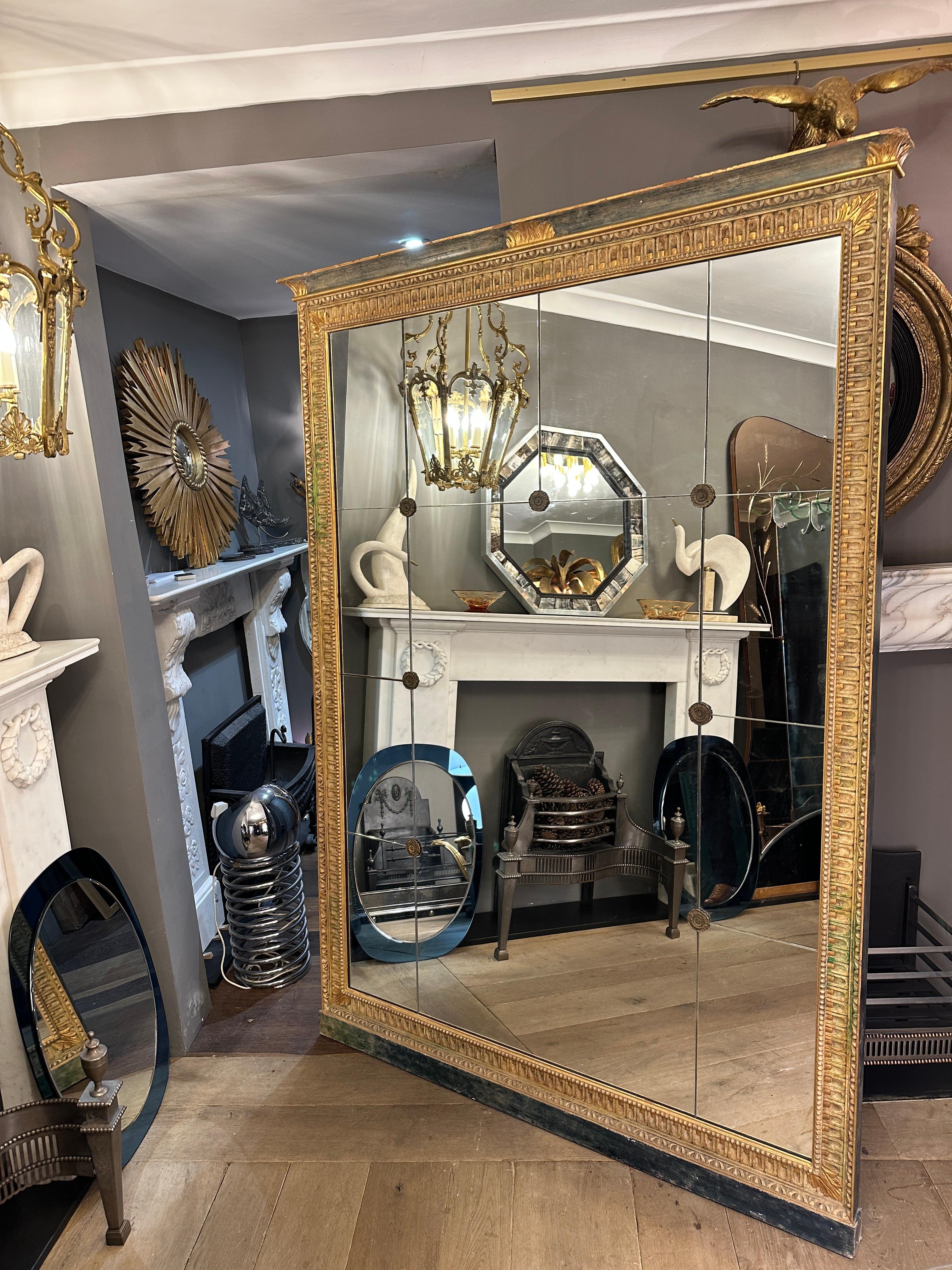A large French Antique Panelled Gold Gilt Mirror In The Empire Style  1
