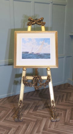 A Large French Carved Gilt Easel  This is a very handsome piece