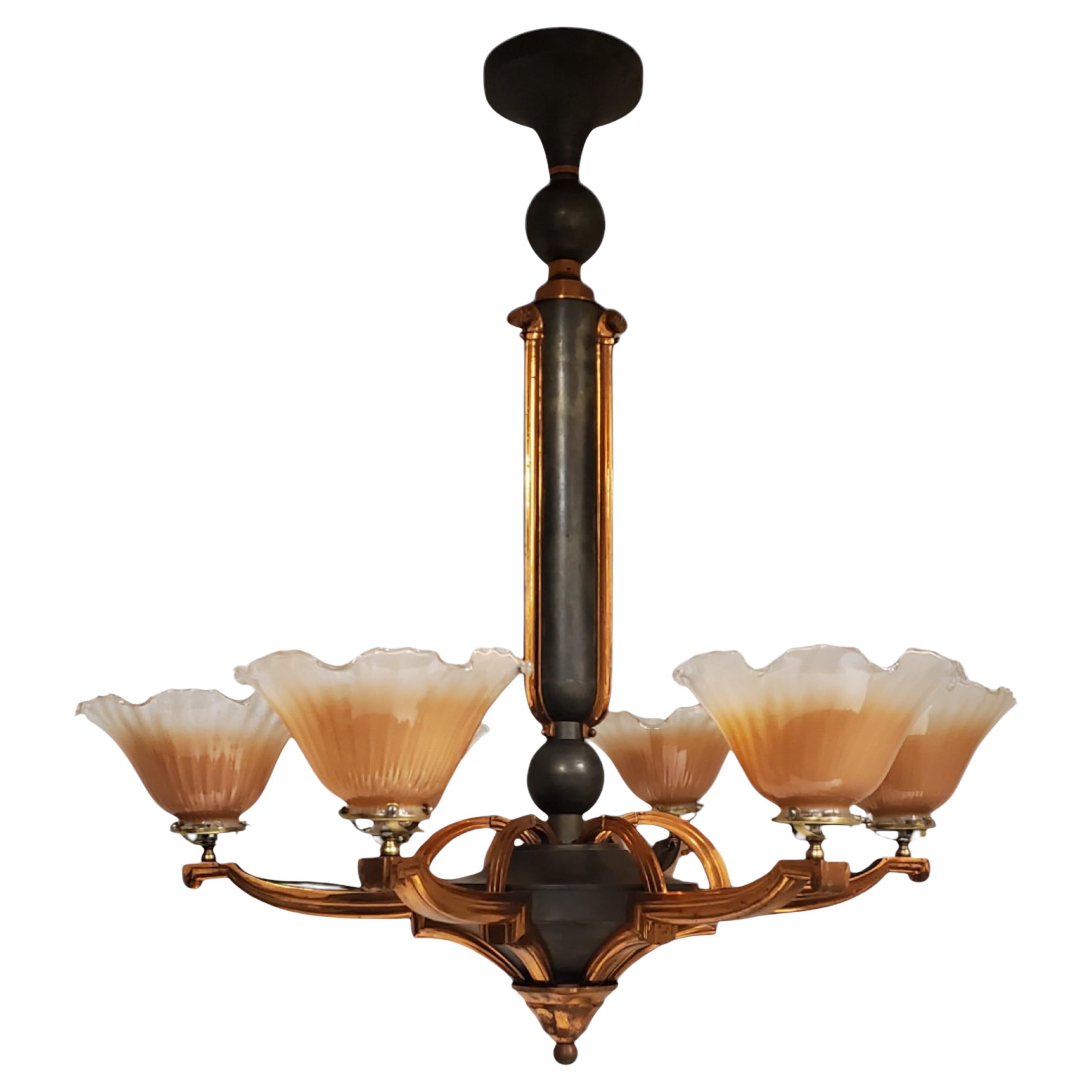 A large French chandelier in copper + verdigris w/ six peach art glass shades