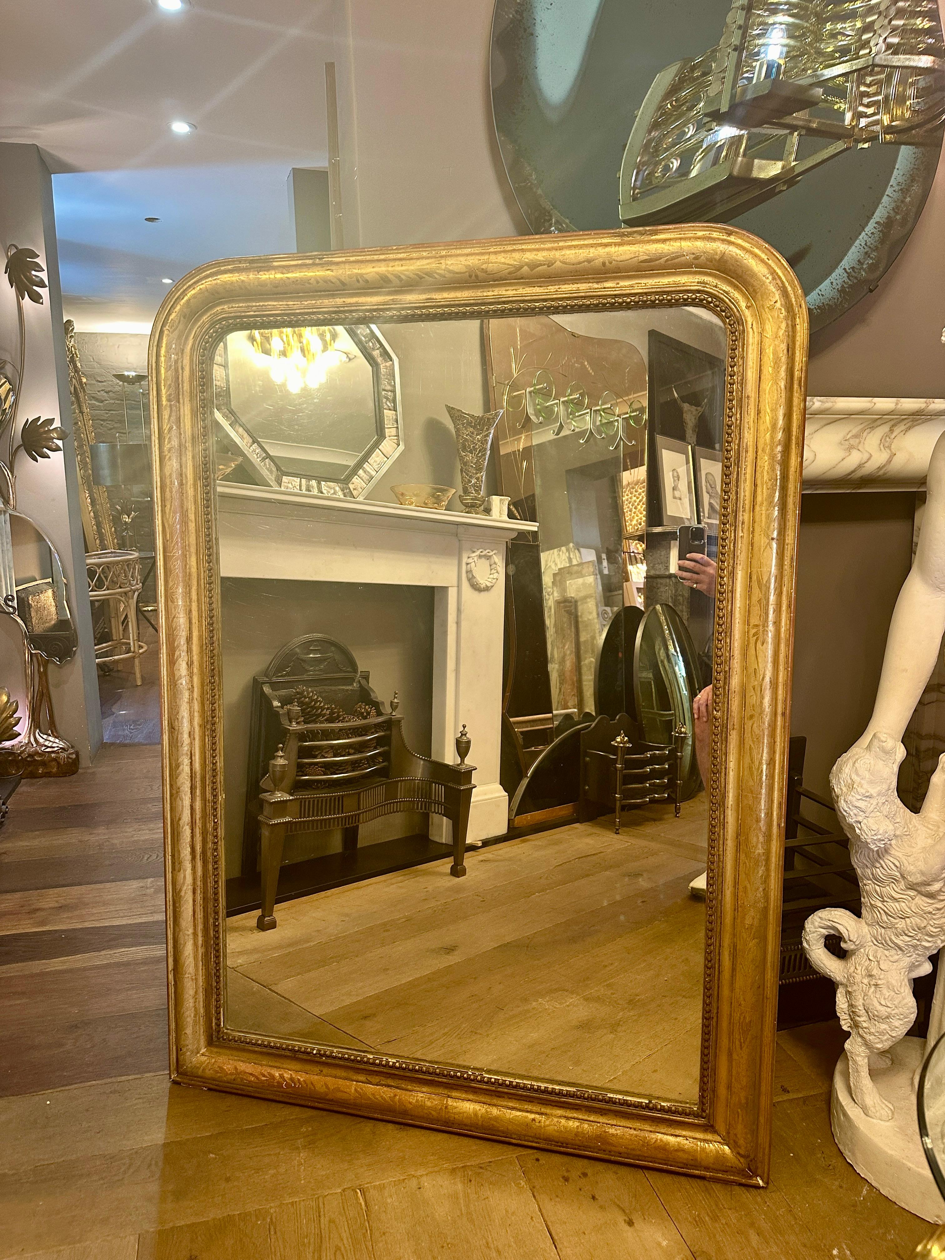 Louis-Philippe Grand miroir ancien de style Louis Philippe en or doré