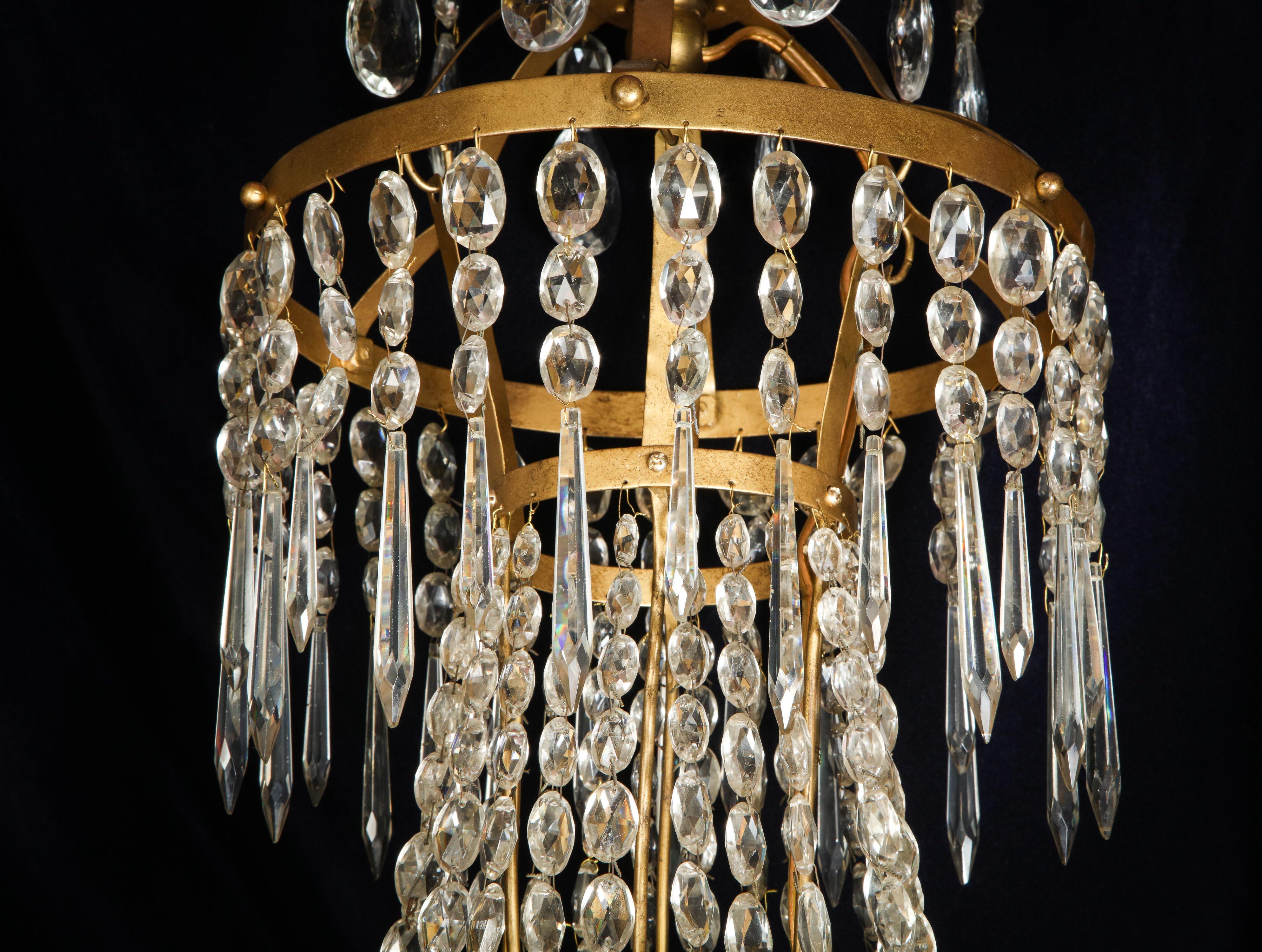 A Large French Neoclassical Style Gilt Bronze and Crystal Chandelier For Sale 6
