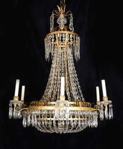 A Large French Neoclassical Style Gilt Bronze and Crystal Chandelier