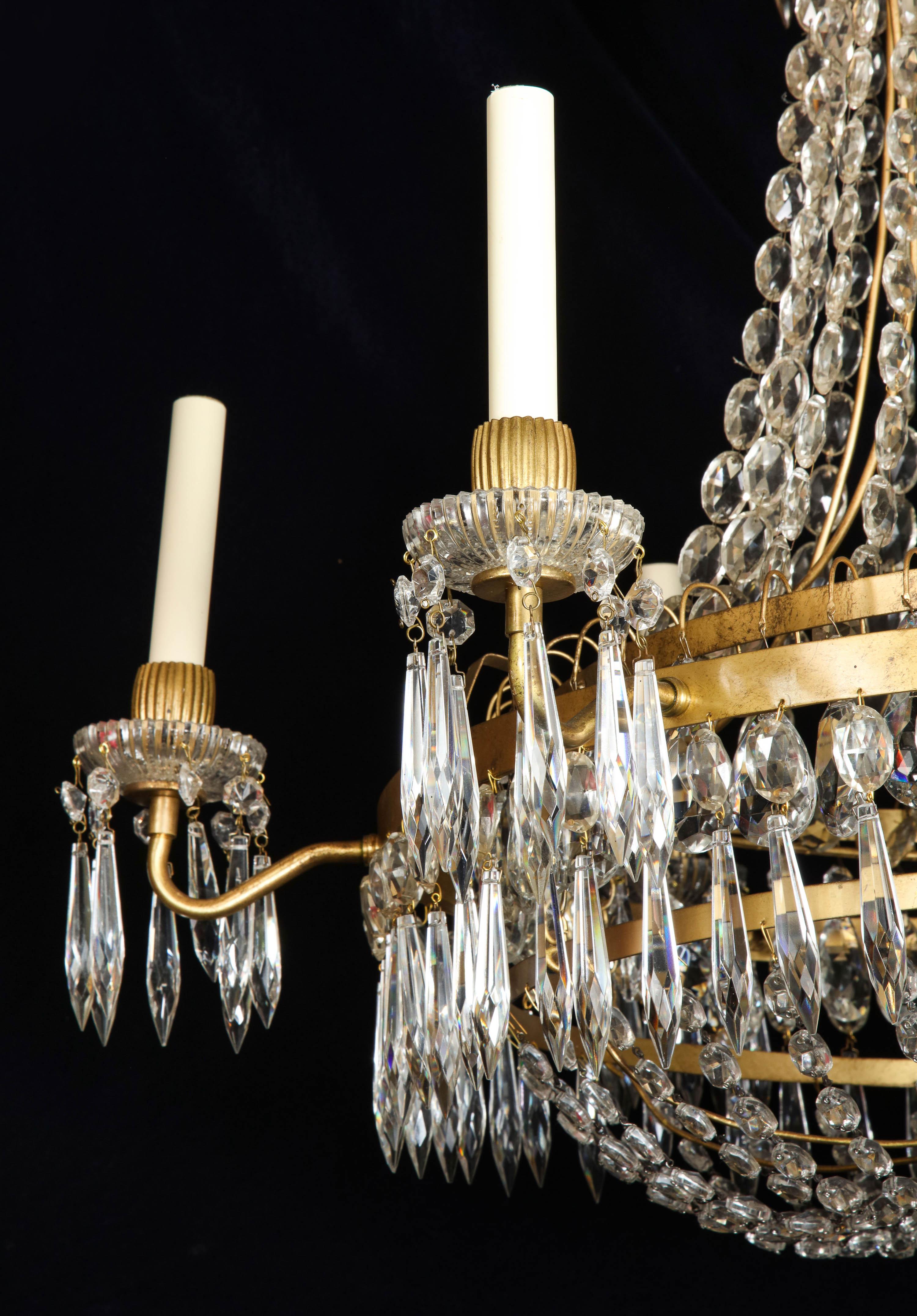 A Large French Neoclassical Style Gilt Bronze and Crystal Chandelier For Sale 4