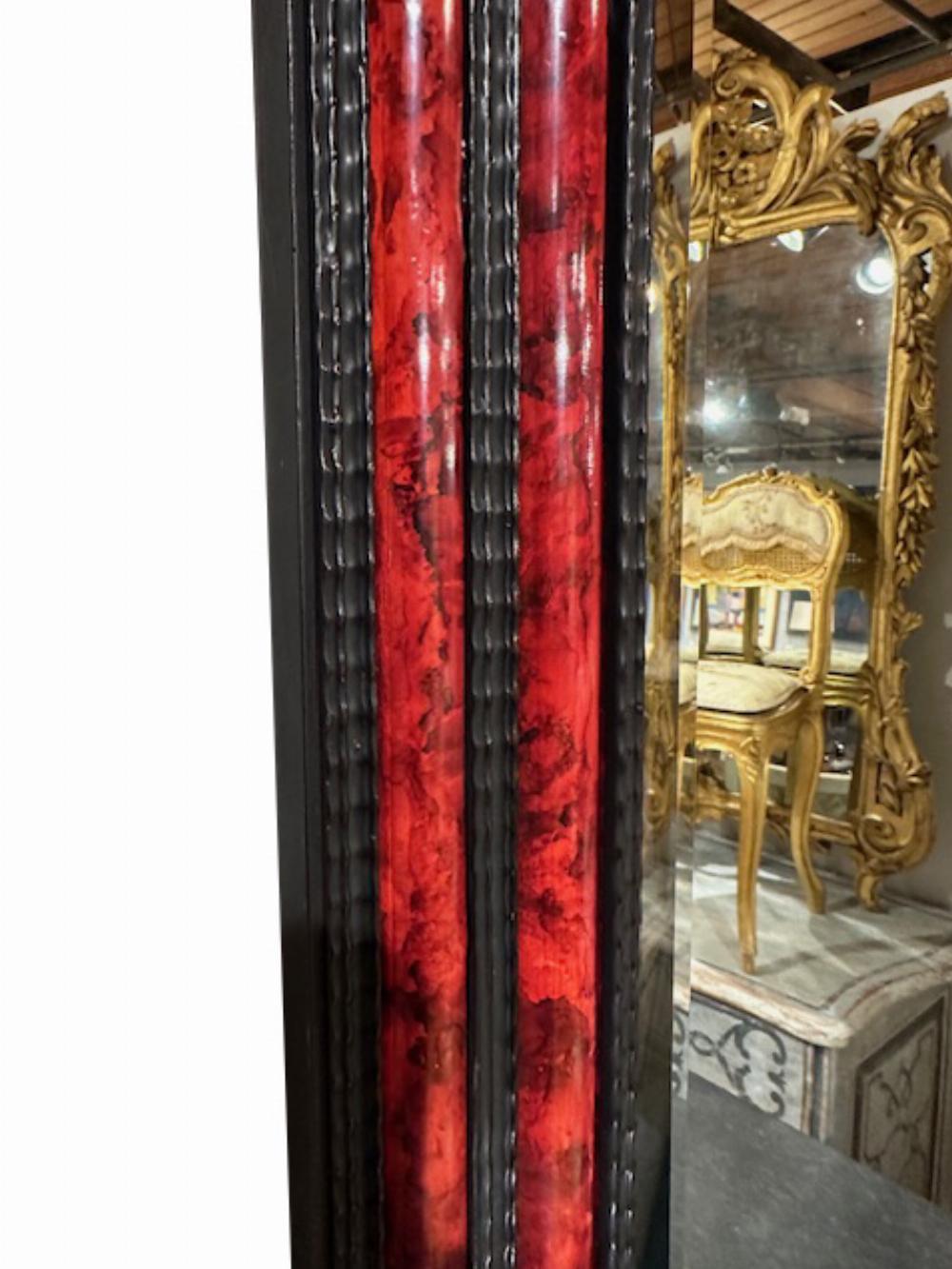 Carved A large French ripple carved and faux tortoiseshell cushion mirror. For Sale