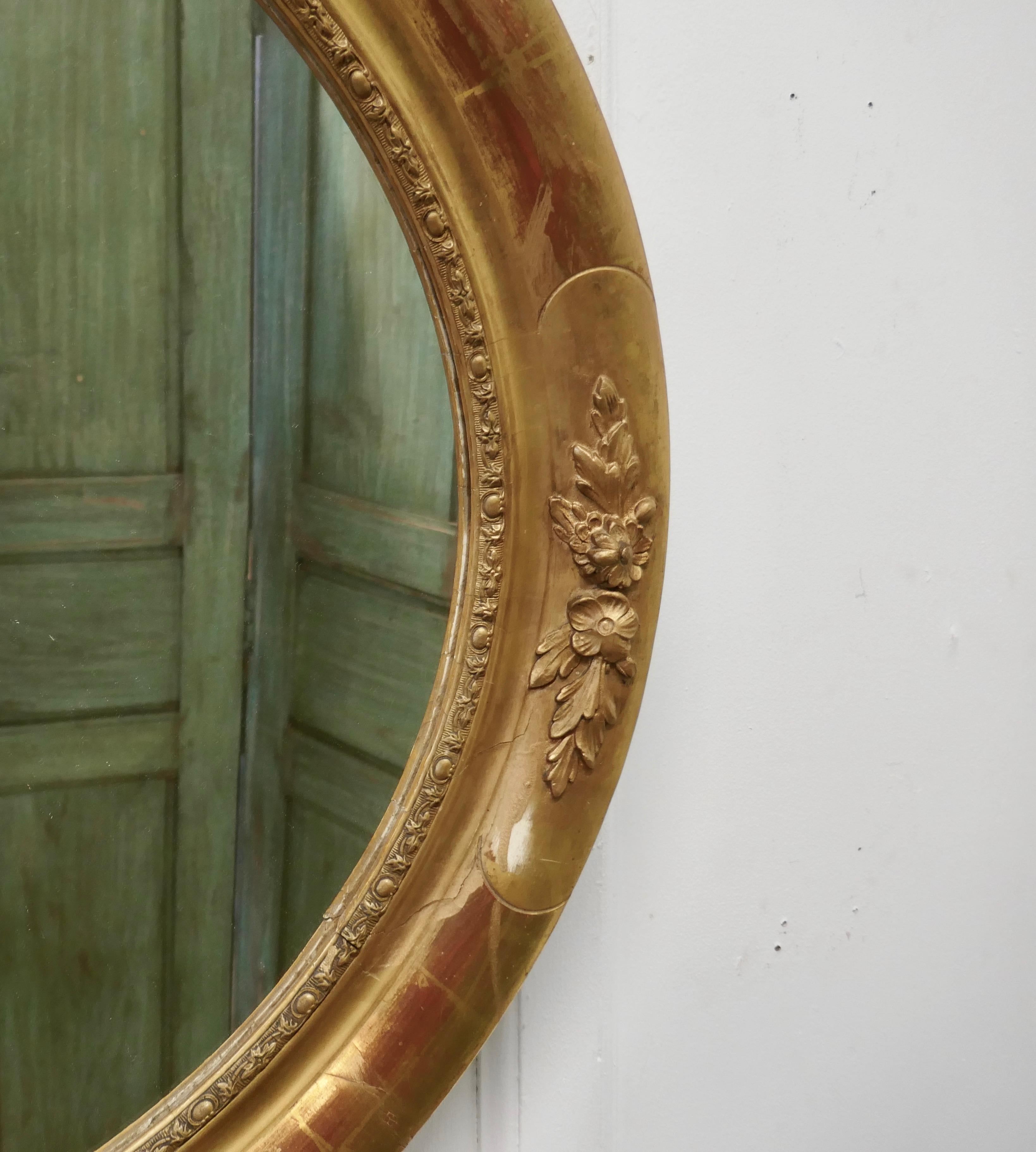 oval gilt mirror