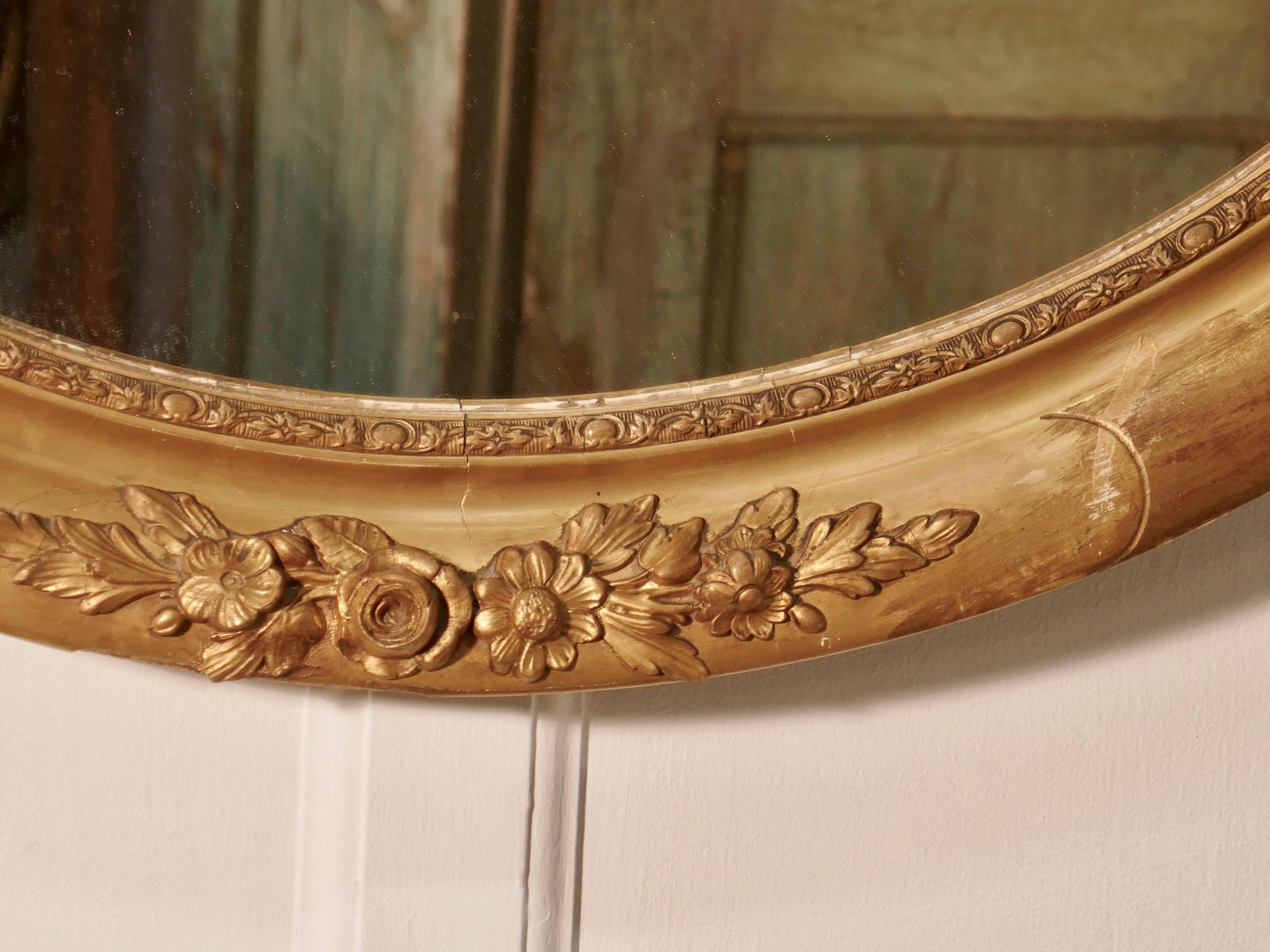 19th Century Large French Rococo Oval Gilt Wall Mirror
