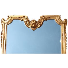 A Large French Transition Louis XIV/XV Style Belle Époque Giltwood Carved Mirror