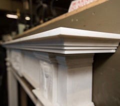 A Large Georgian Manner Carved Statuary & Sienna Marble Fireplace Surround.