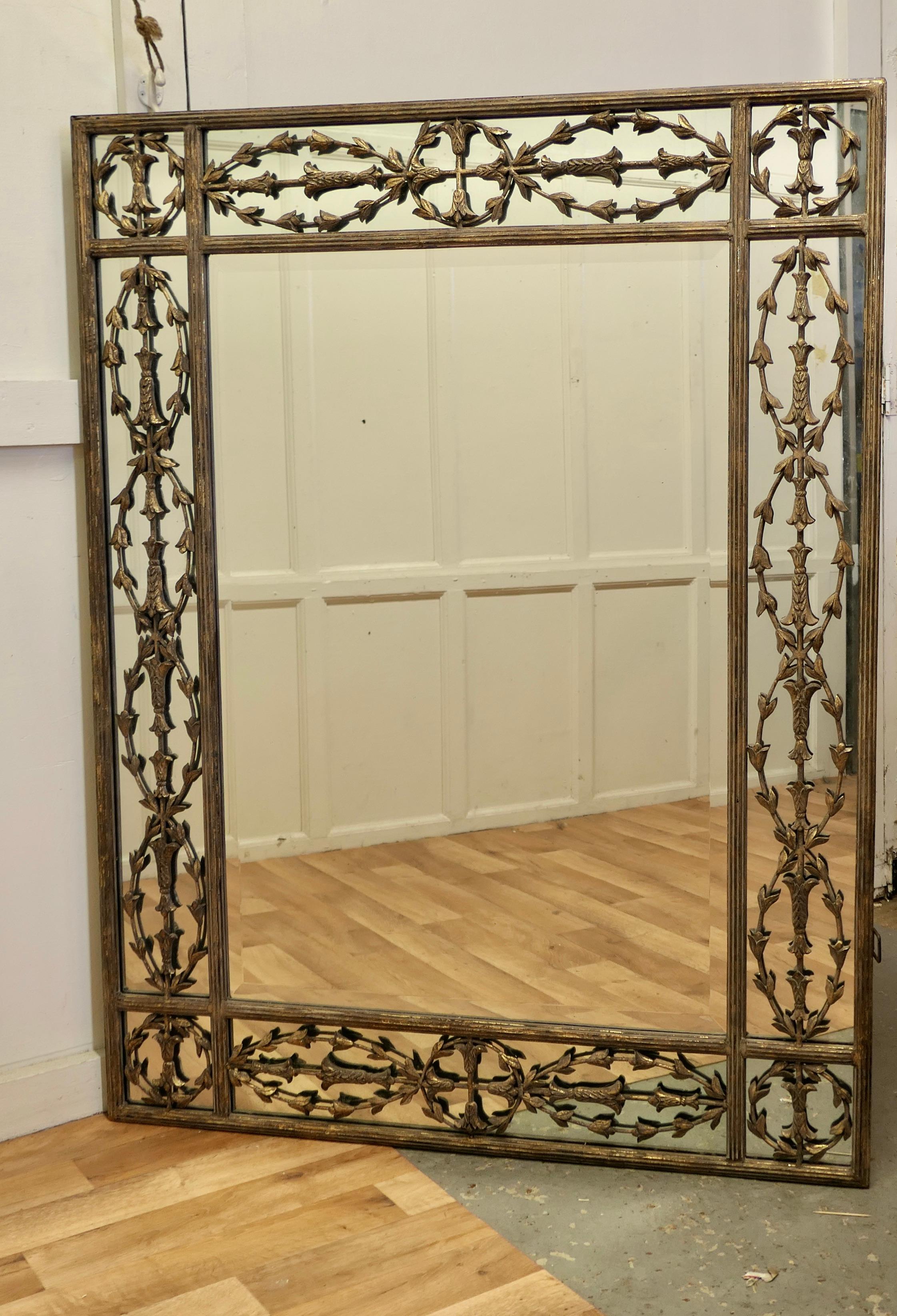 20th Century Large Gilded Iron Margin Wall Mirror