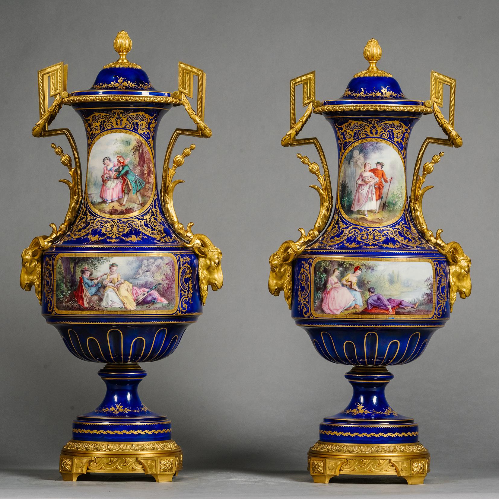 19th Century A Large Gilt-Bronze and Sèvres Style Porcelain Three-Piece Clock Garniture For Sale