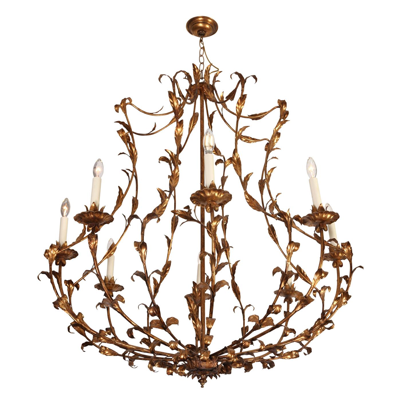 Although this fantastic chandelier is large in scale, its open design gives it a light, airy feeling.  The fixture is composed of eight arms, each with a floral shaped bobeche supporting the lights.. The fanciful frame consists of a scrolling leaf