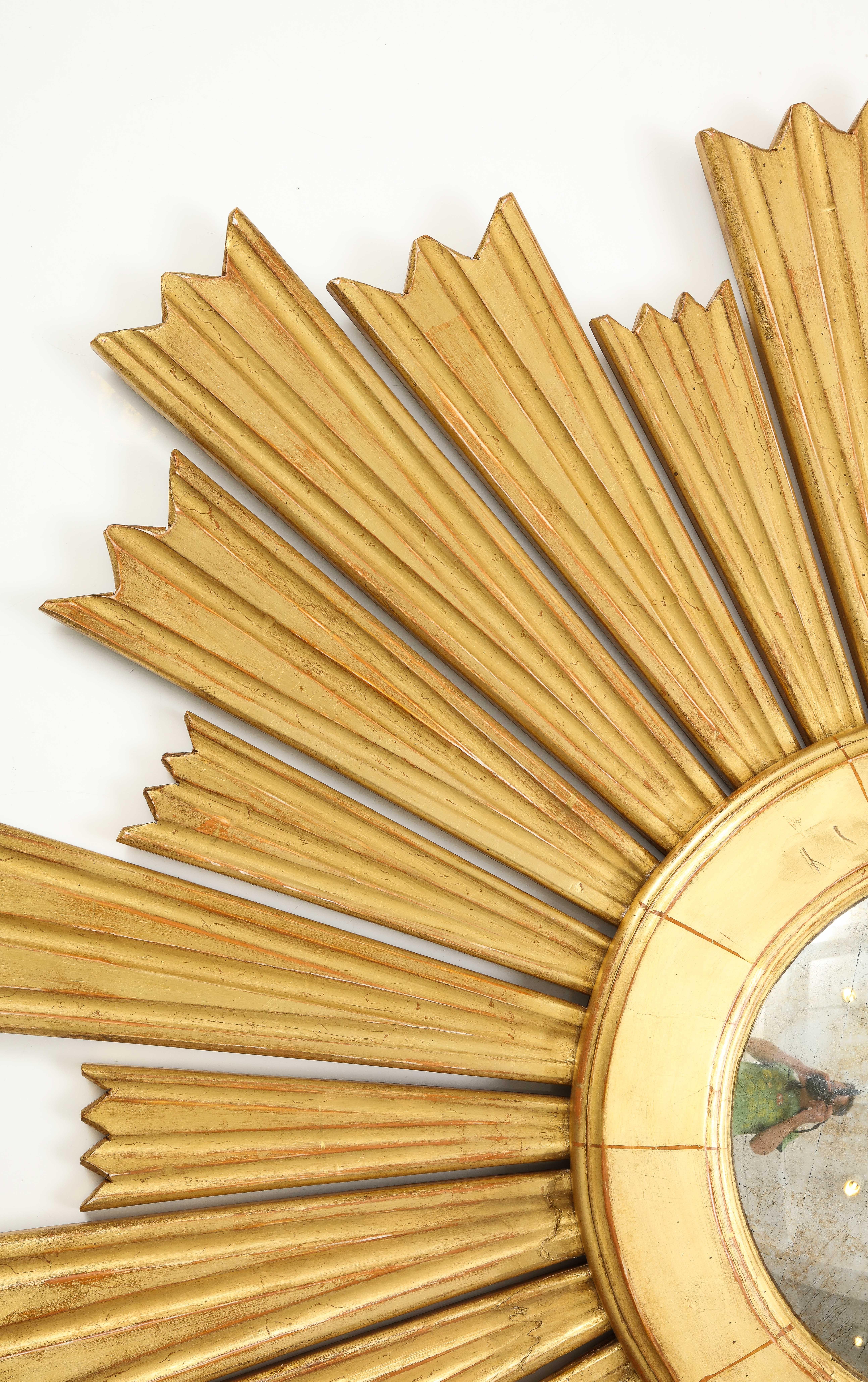 A Large Giltwood Sunburst Mirror In Good Condition For Sale In New York, NY