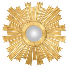 Grand miroir Sunburst en bois doré
