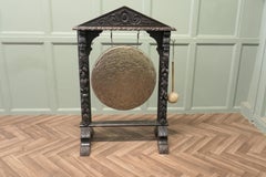 A Large Gothic Carved Oak and Brass Dinner Gong