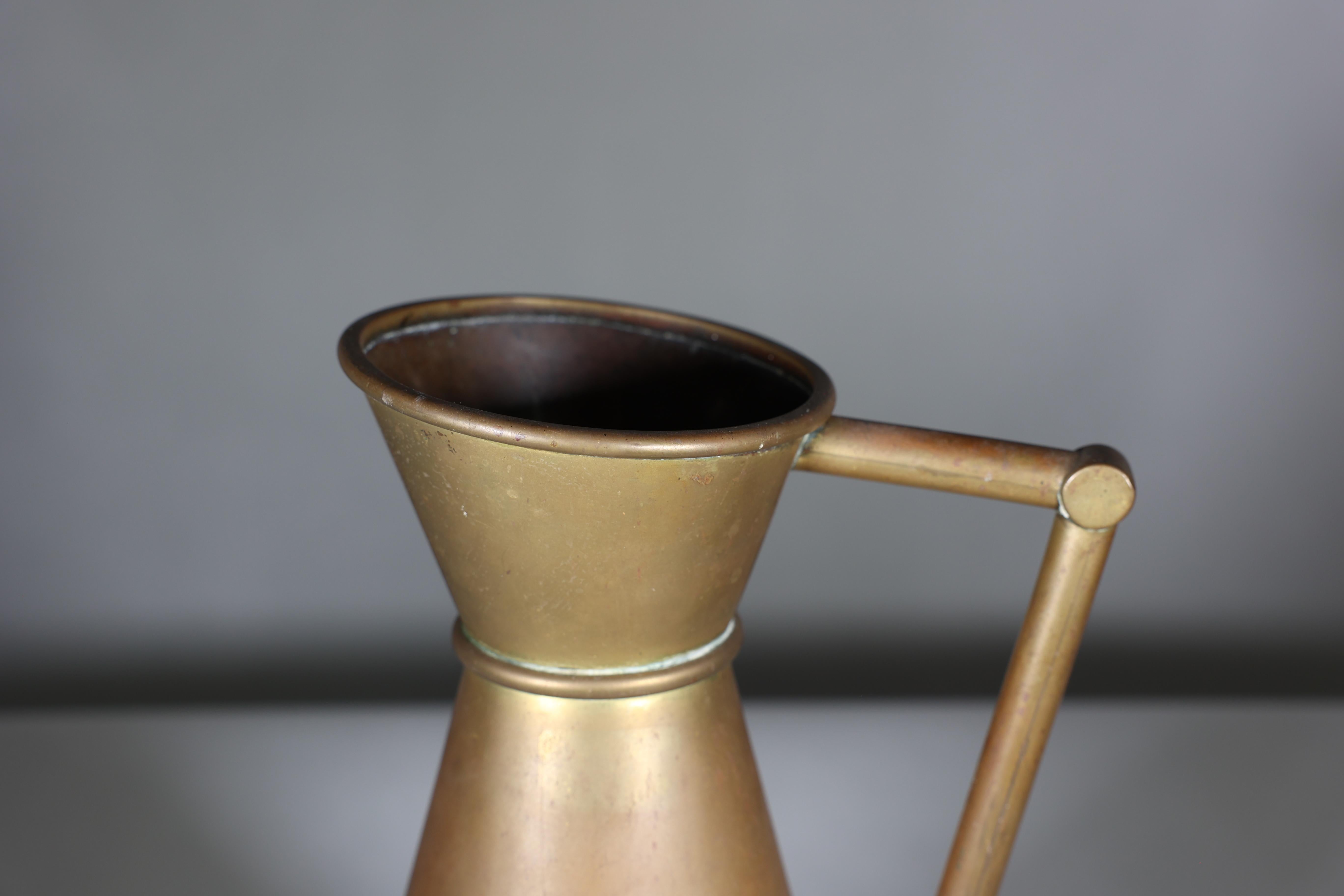 A large Gothic Revival heavy brass jug with a simple angular form and handle. For Sale 4
