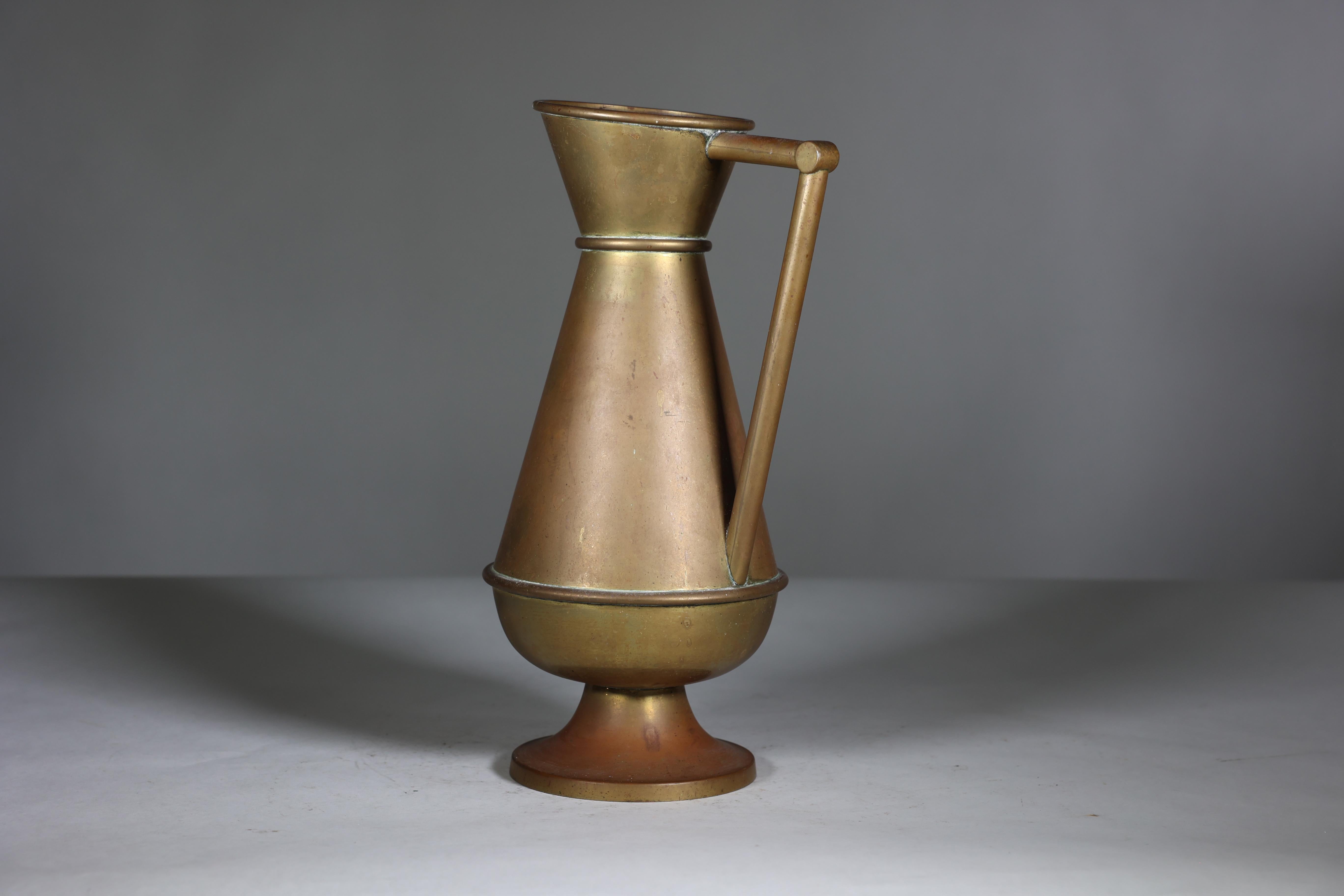 English A large Gothic Revival heavy brass jug with a simple angular form and handle. For Sale
