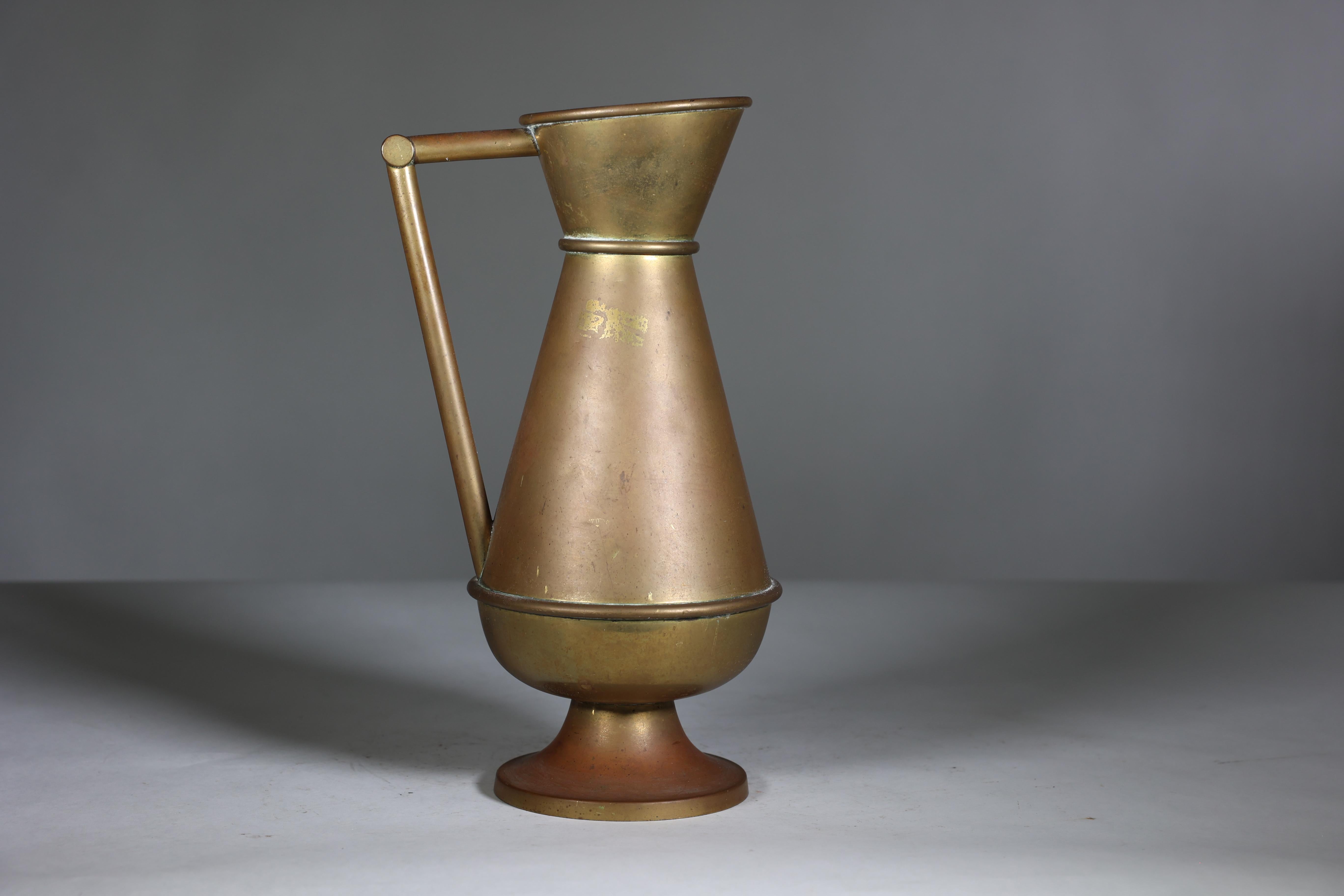 A large Gothic Revival heavy brass jug with a simple angular form and handle. For Sale 1