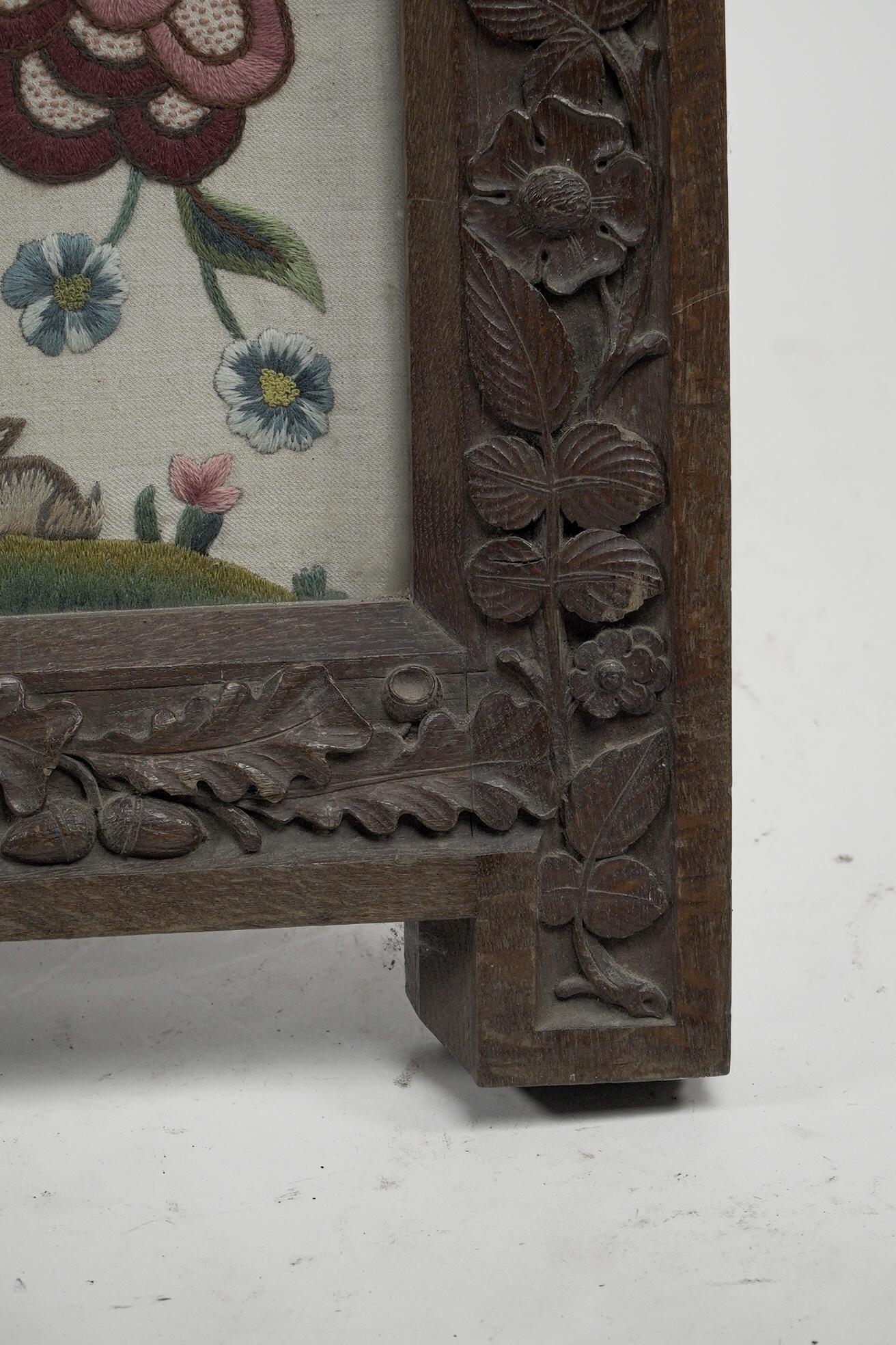 A large Gothic Revival picture frame with stylized floral carvings For Sale 10