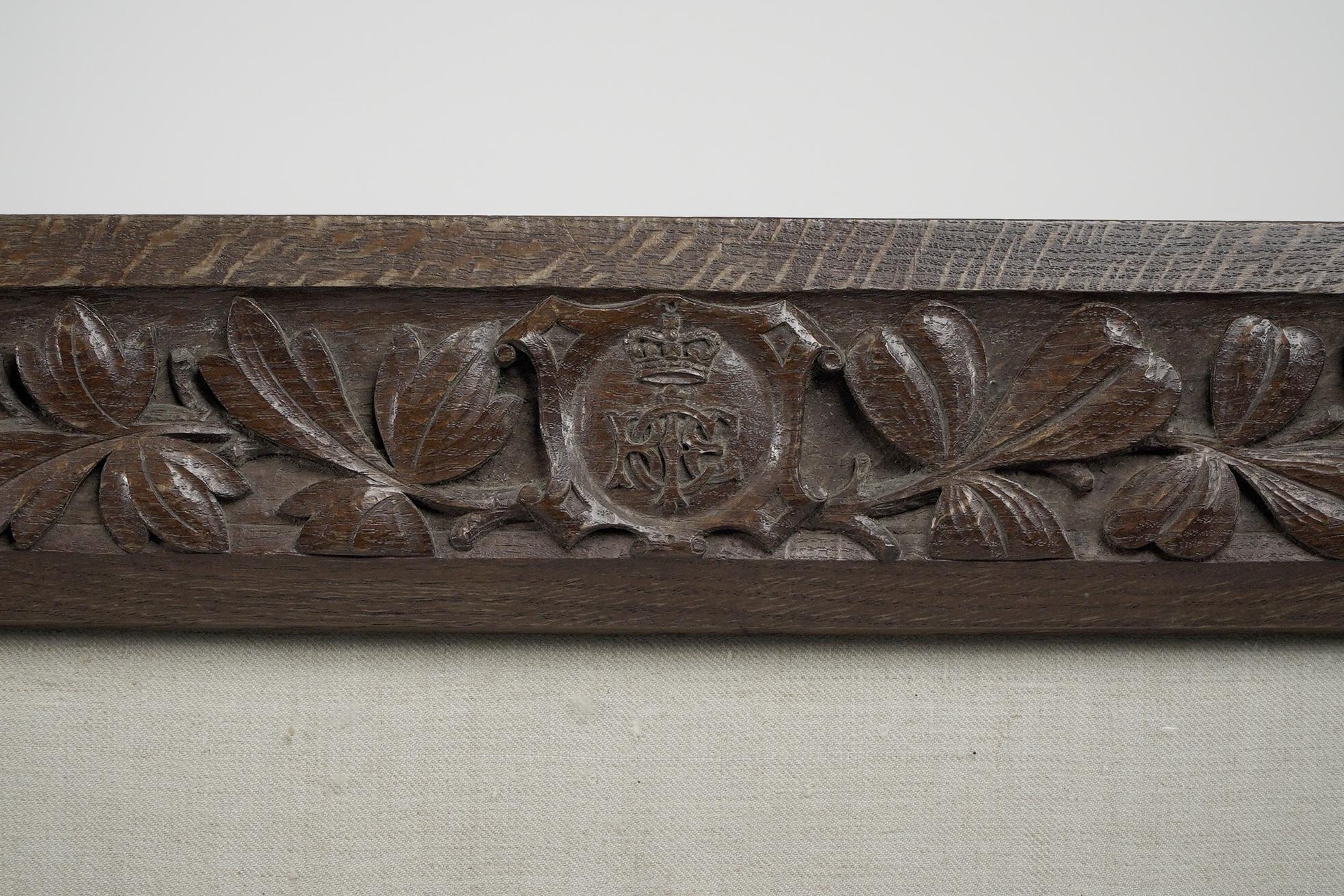 A large Gothic Revival picture frame with stylized floral carvings For Sale 1