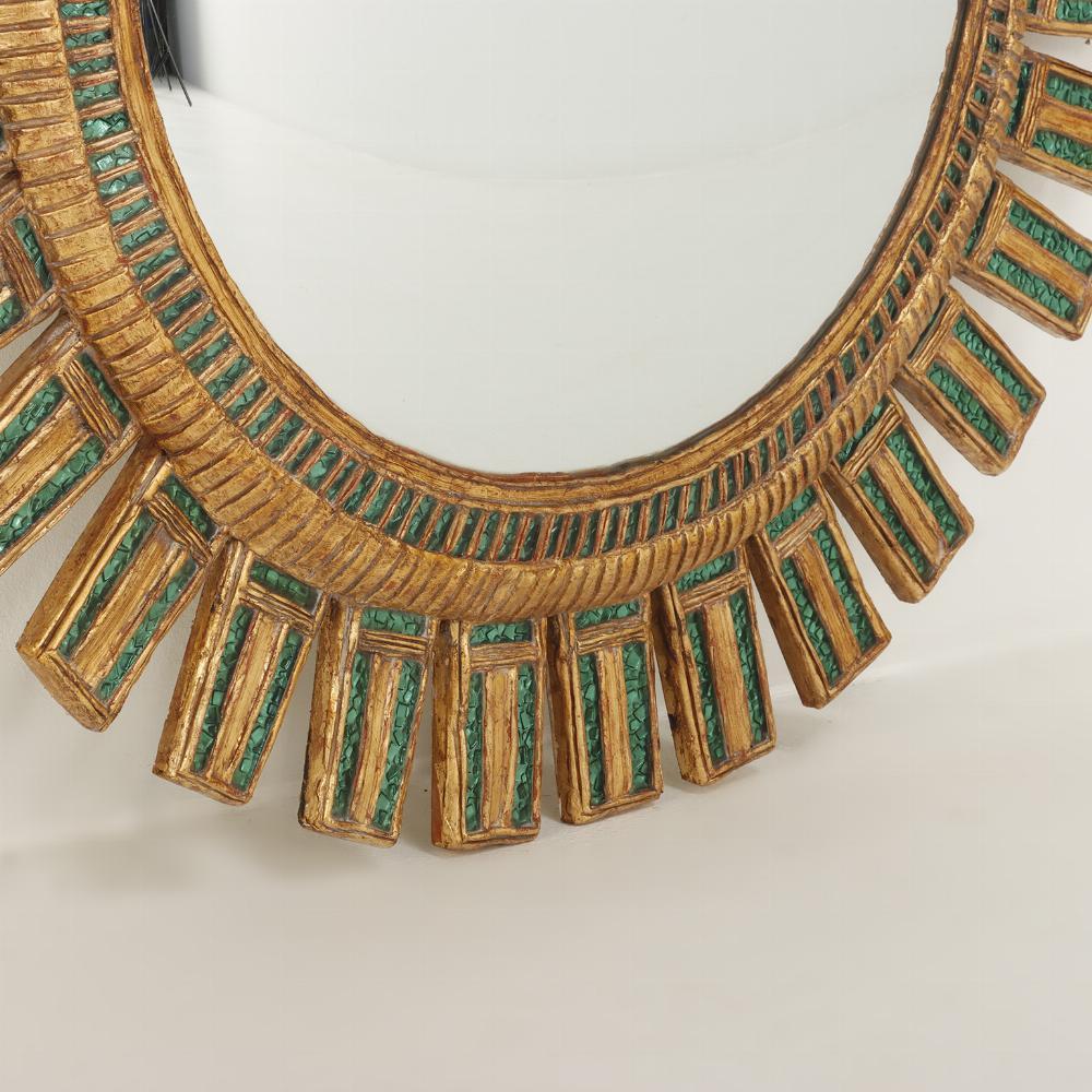 Argentine A large green glass and resin convex sunburst mirror. For Sale