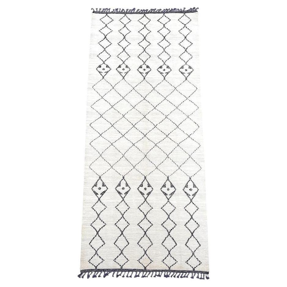 A large handwoven Moroccan Beni Ourain wool berber rug with diamond pattern For Sale