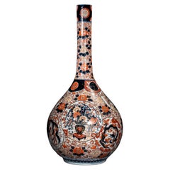 Grand vase Imari avec dragon, phénix et fleurs