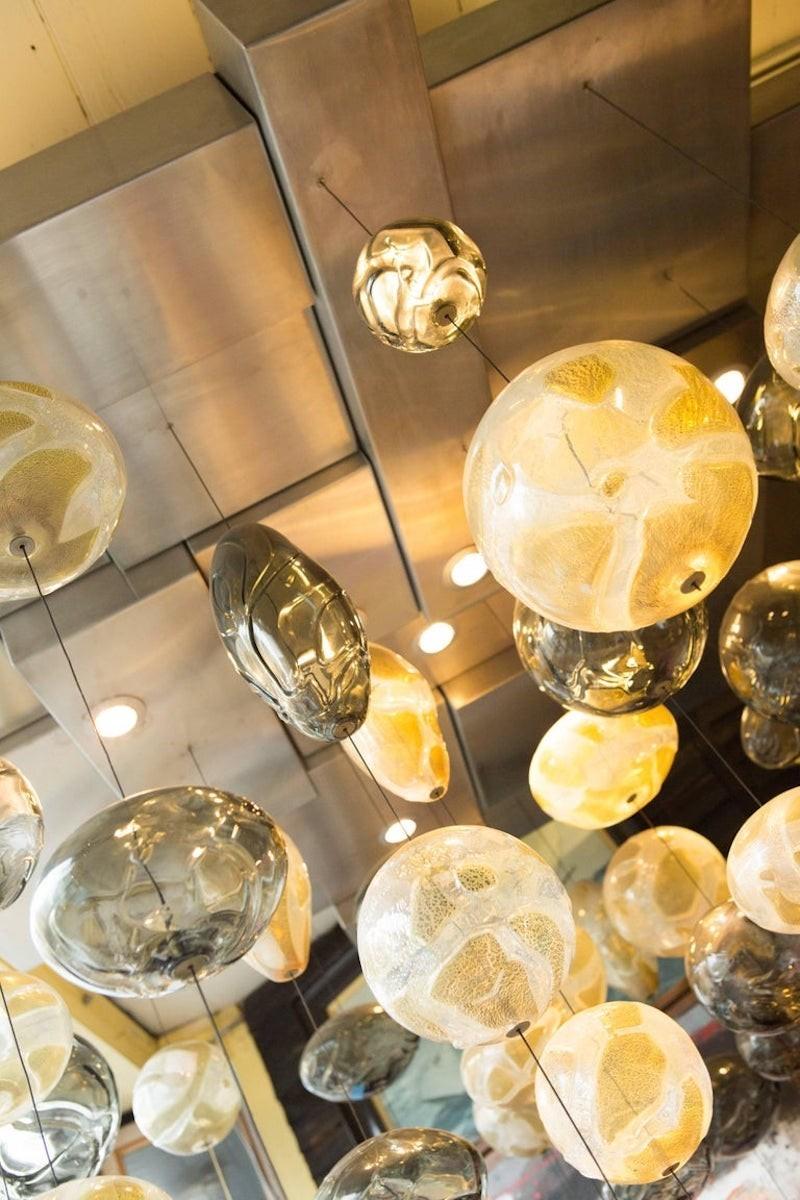 Hand-Crafted A Large Imposing Bespoke Ken Gangbar Glass And Steel Chandelier For Sale