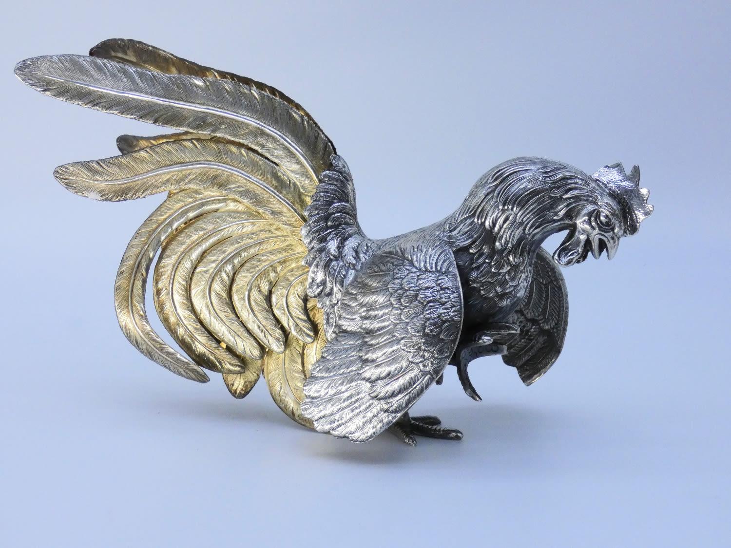 A Large Impressive Silver Rooster
25.5ozt. weight.
Finely chased, with parcel-gilt flowing tail feathers.
In great condition
11.5in. L.



