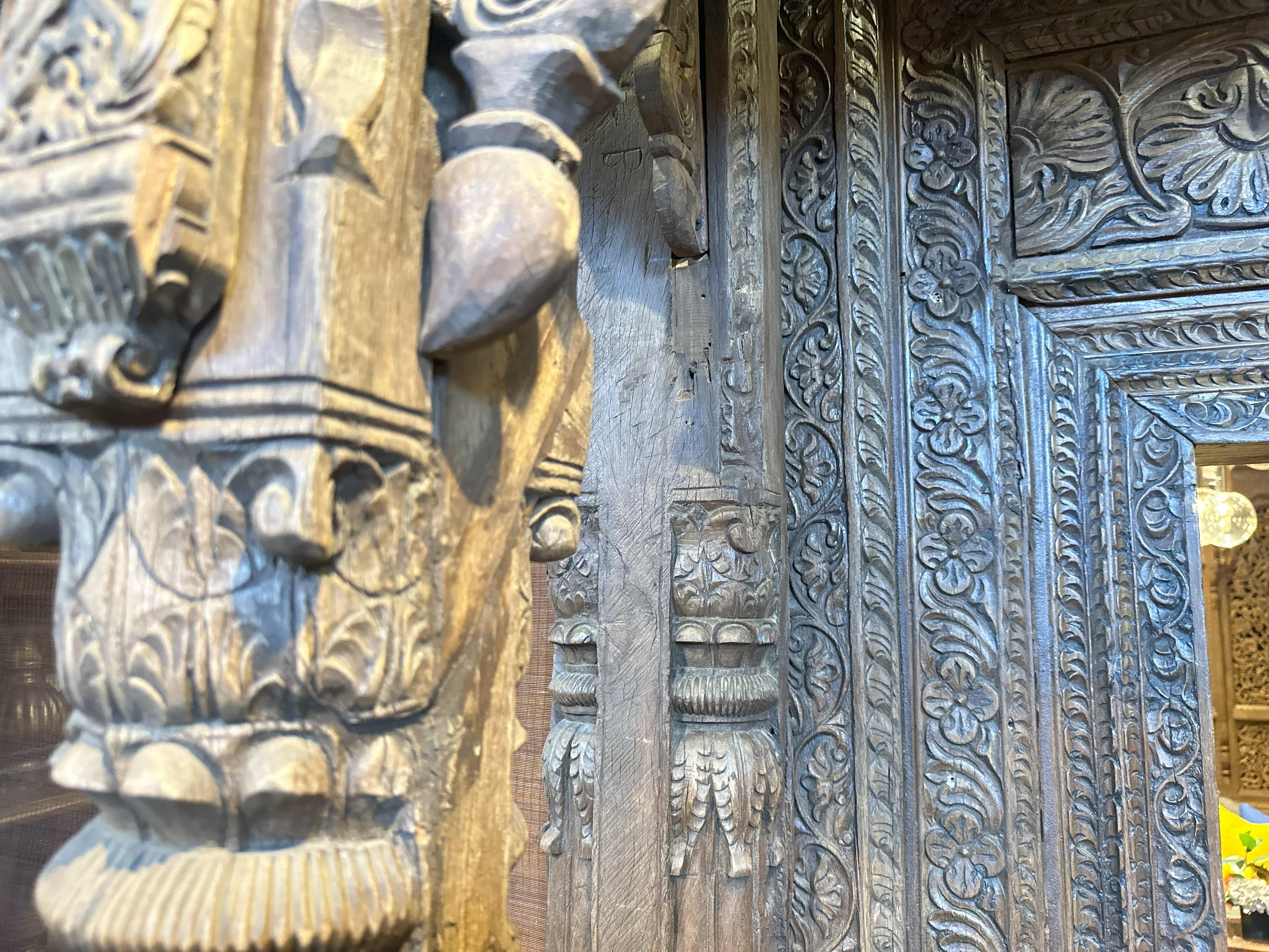 A Large Indian Architectural  Facade With Doorway and Flanking Window Seats 7