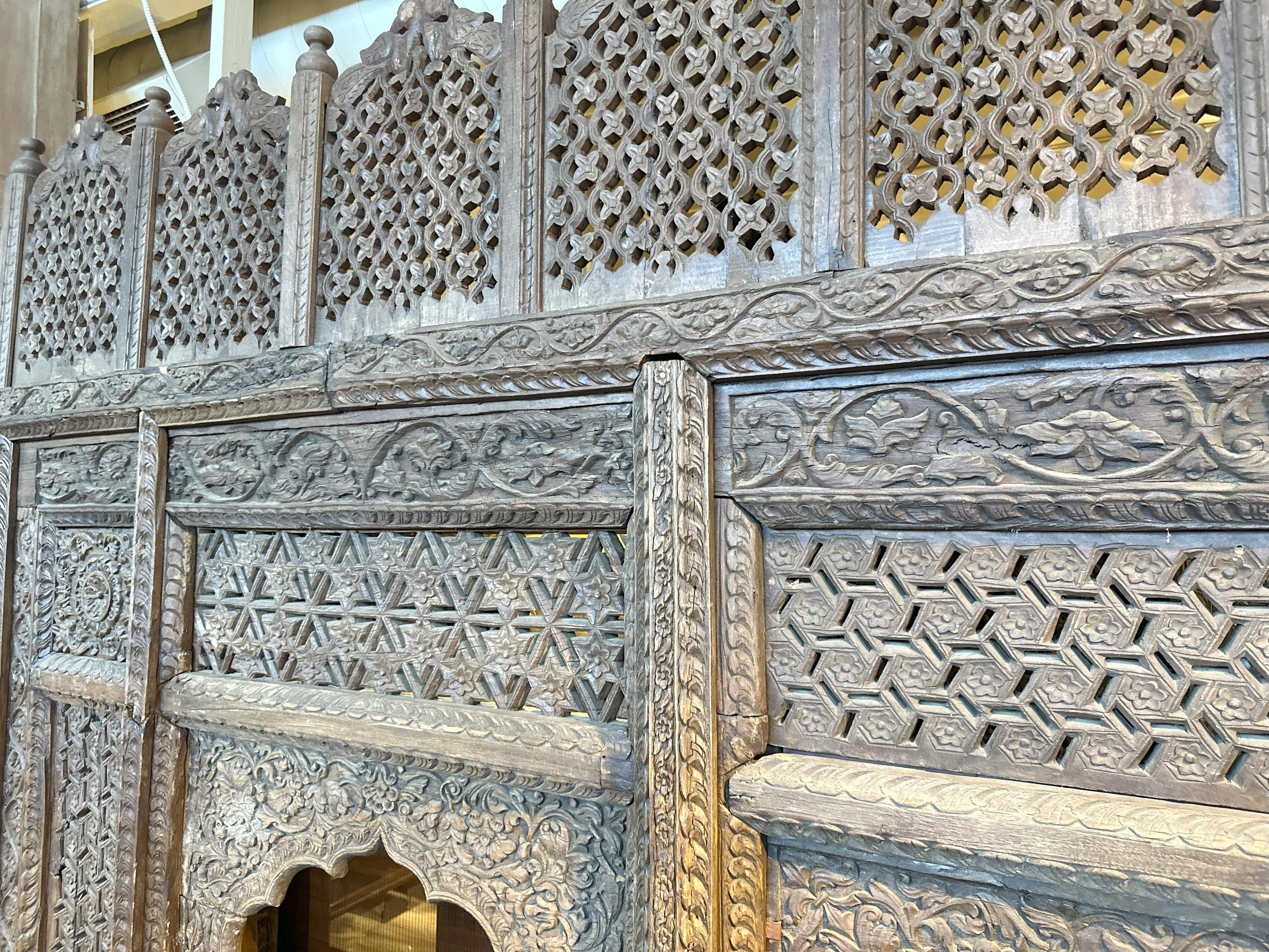 A Large Indian Architectural  Facade With Doorway and Flanking Window Seats 3