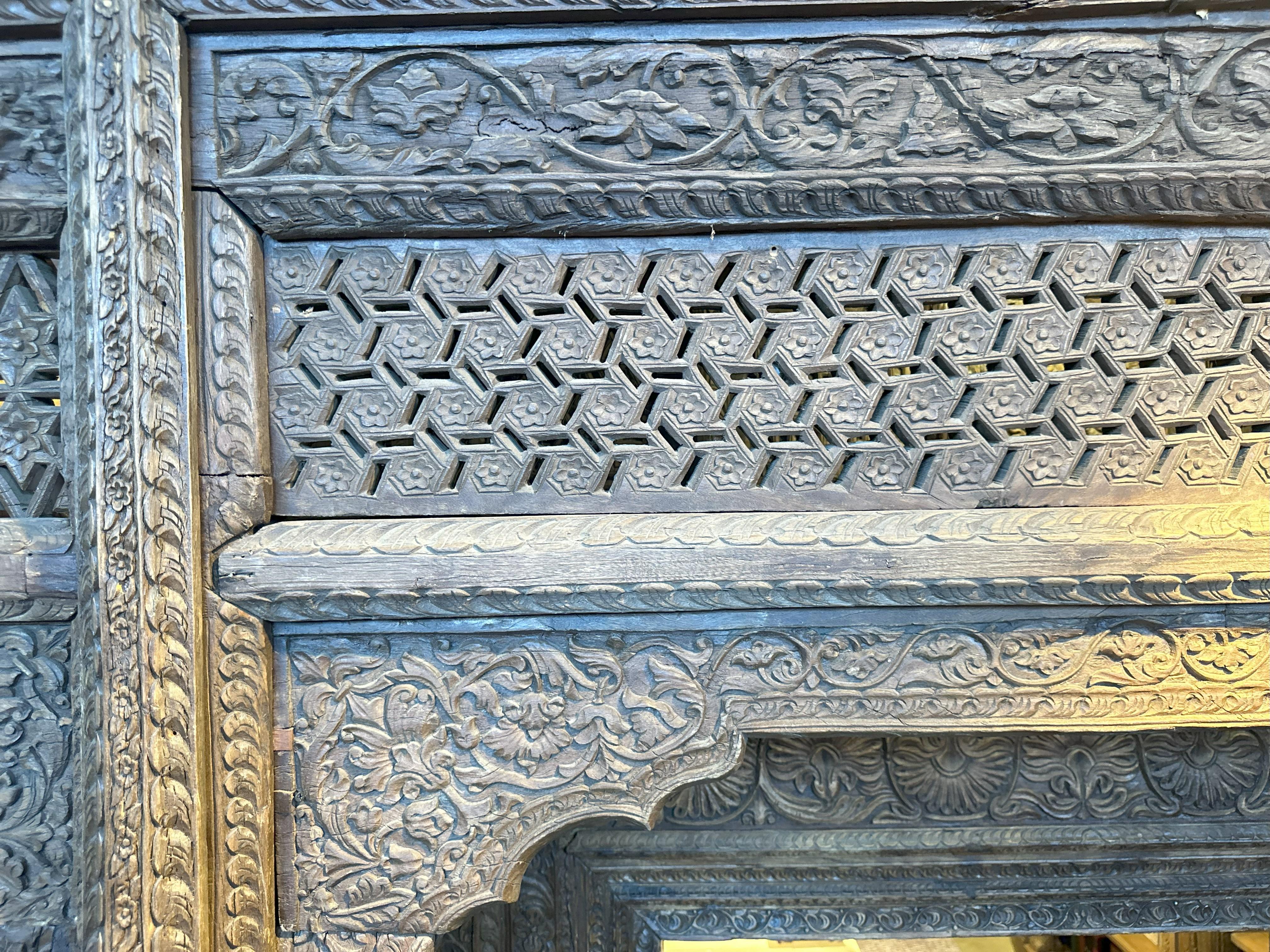 A Large Indian Architectural  Facade With Doorway and Flanking Window Seats 4